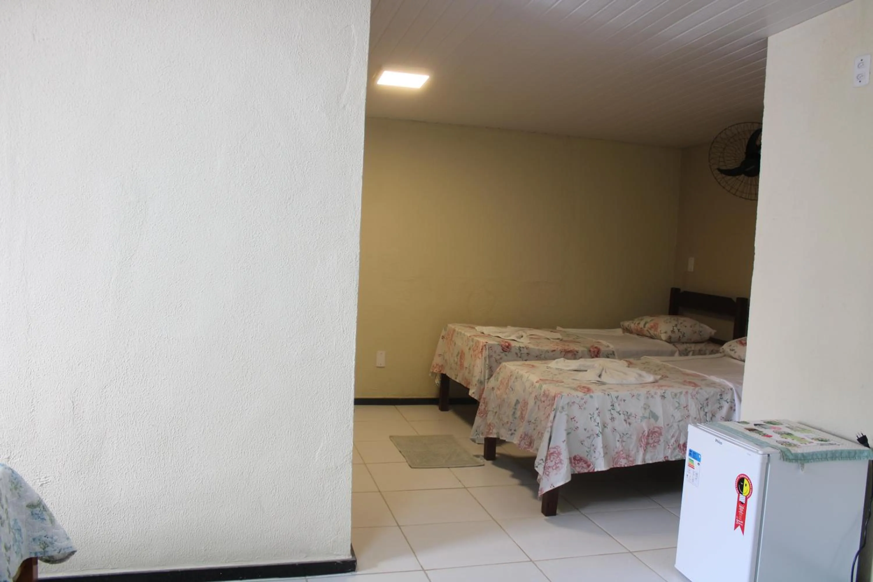 Bed in HOTEL CANTINHO DAS FLORES