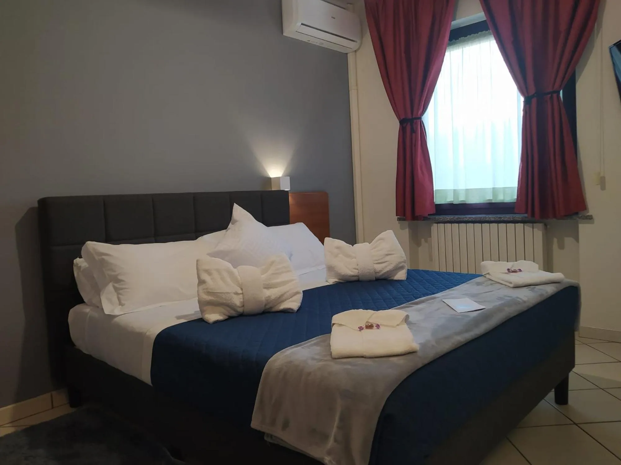 Bed in Hotel Baiardo