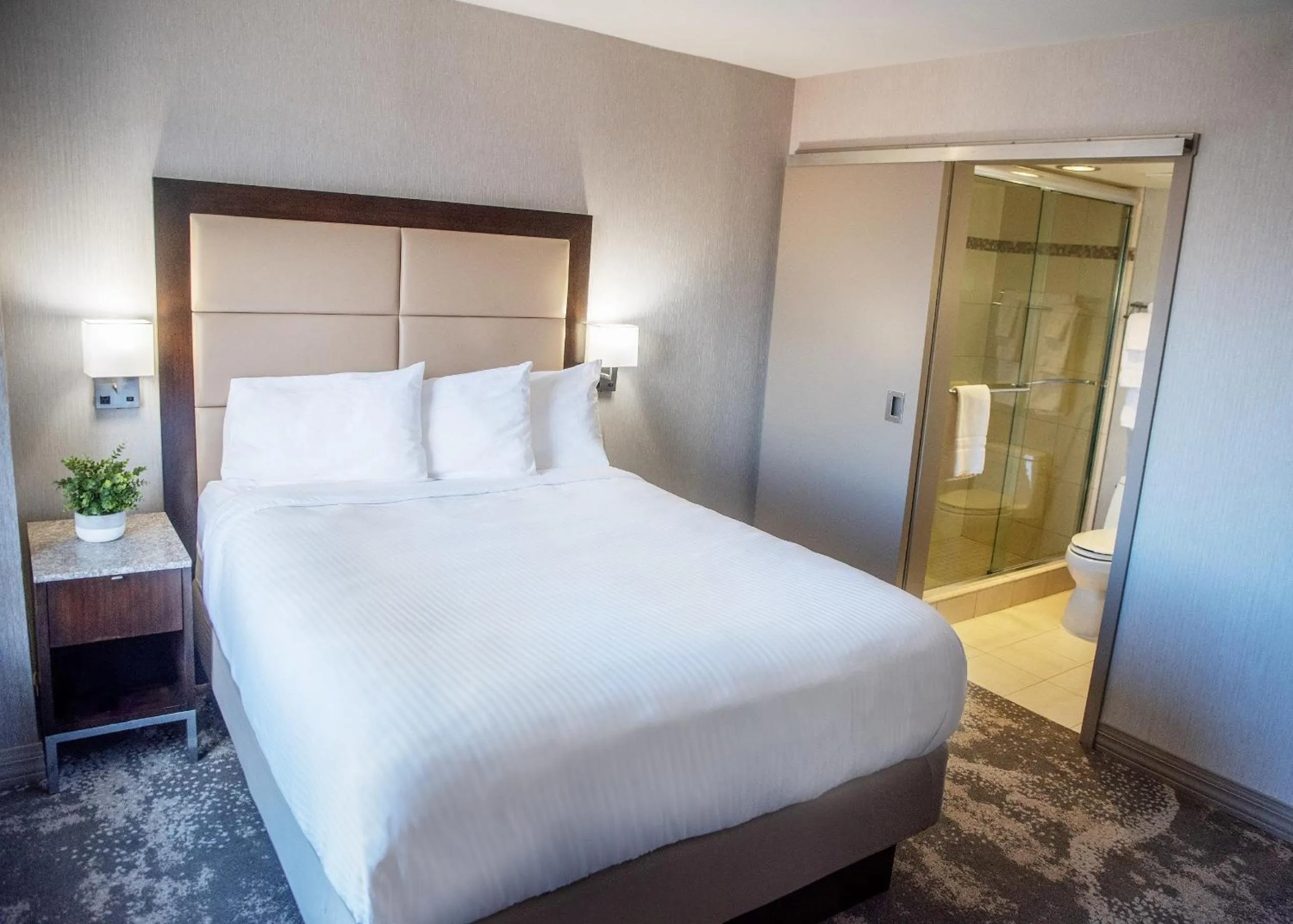 Bed in The Madison Concourse Hotel