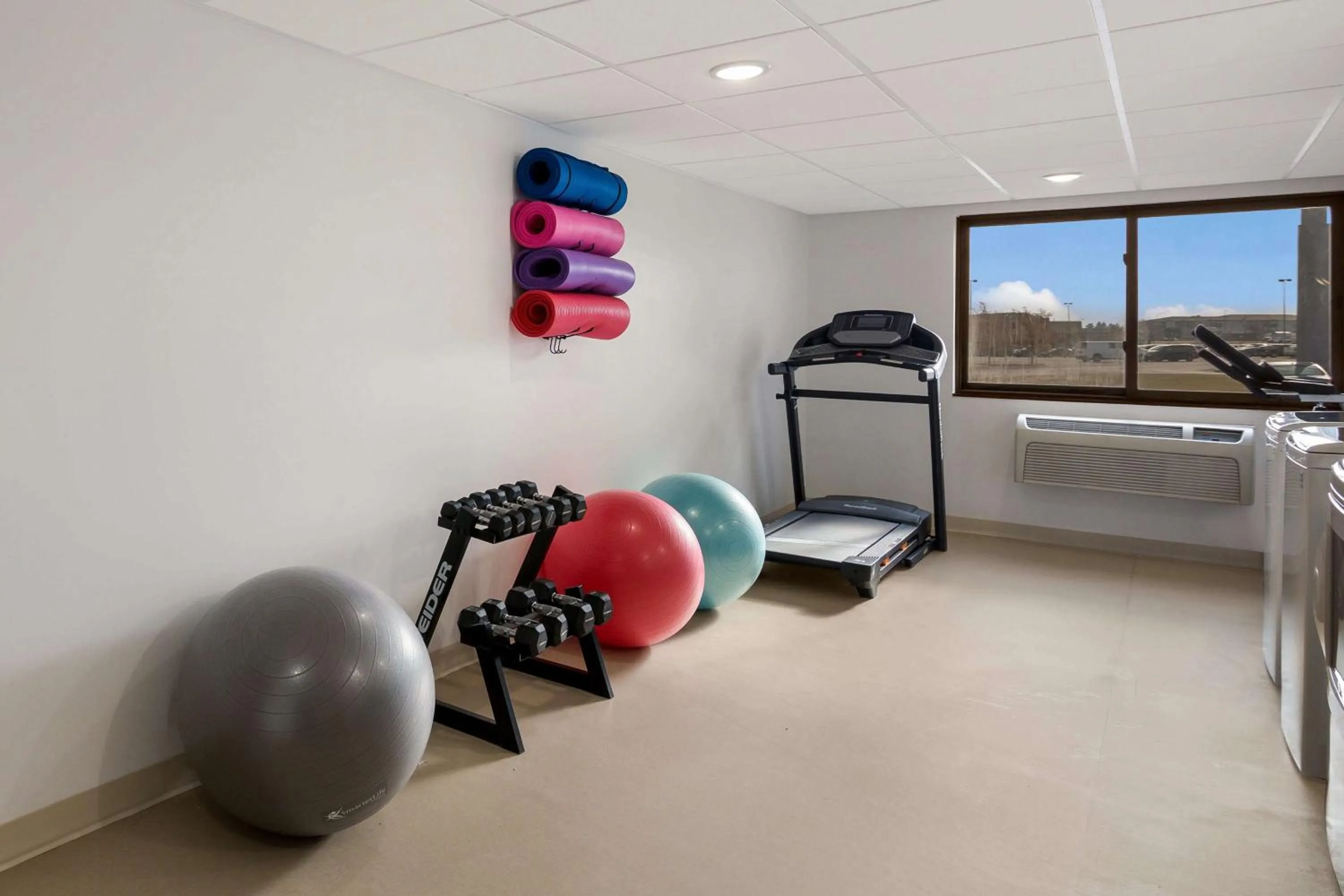 Fitness centre/facilities in Revel Hotel Minot - SureStay Collection by Best Western