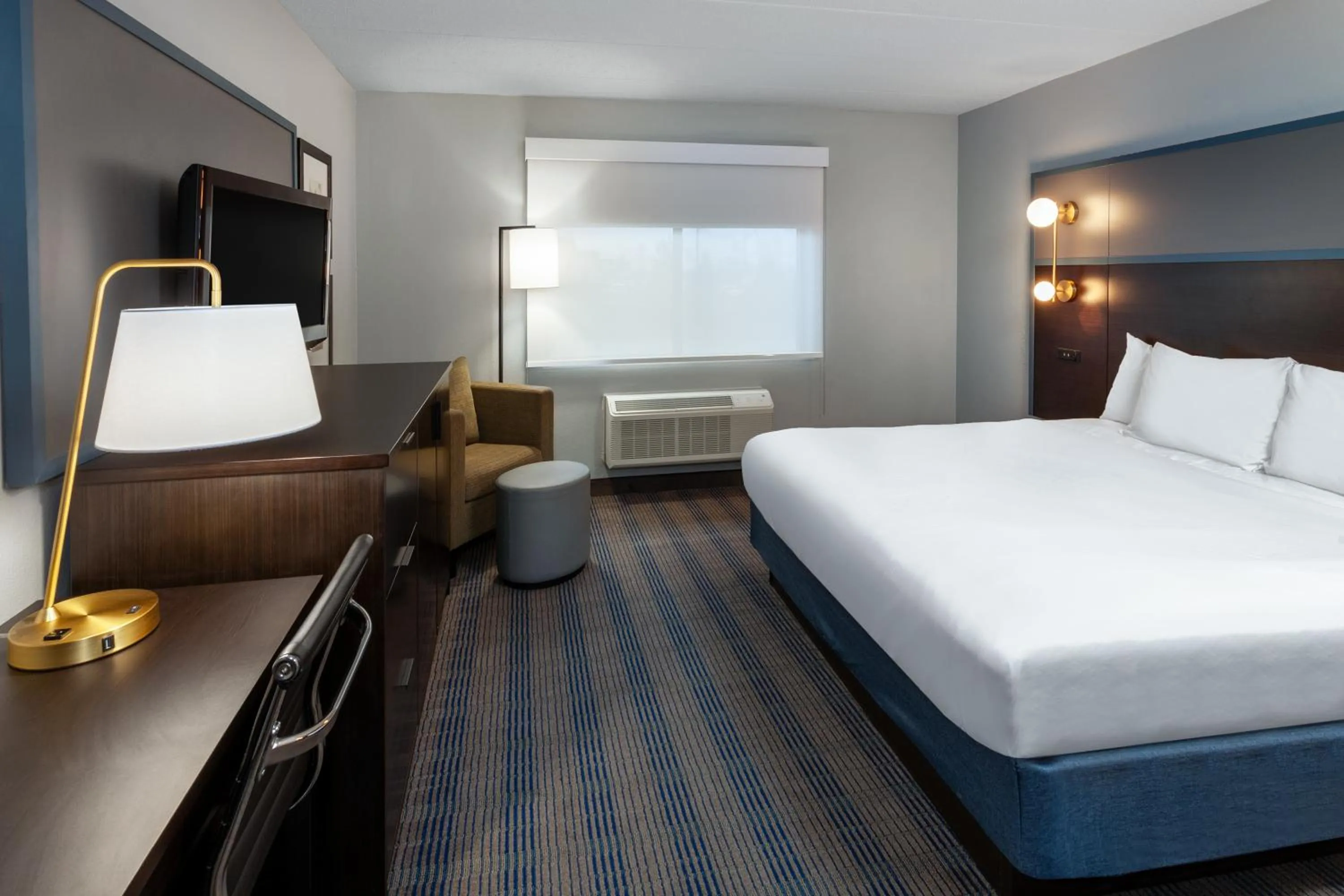 Bed in AmericInn by Wyndham Peoria