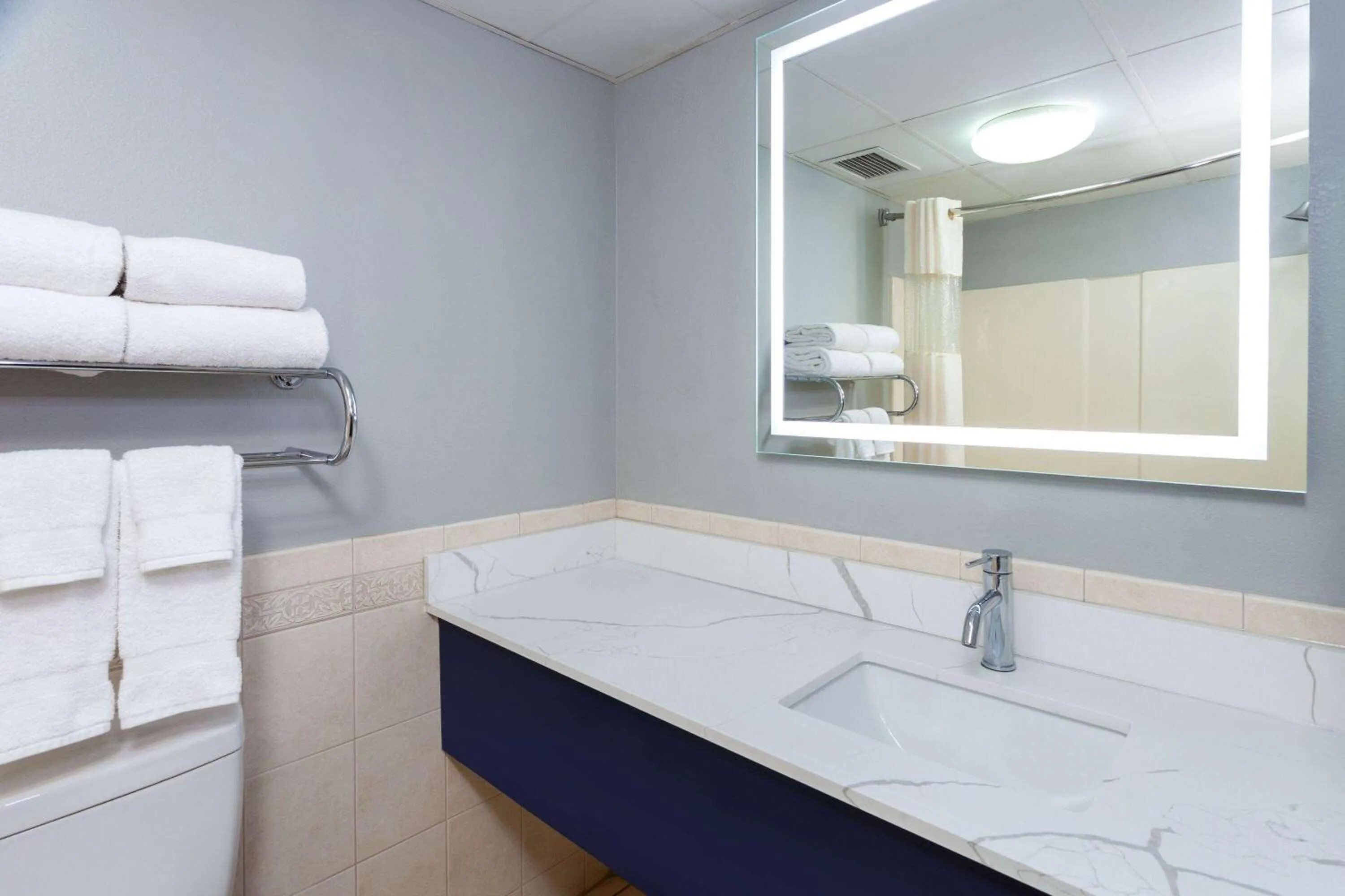 Bathroom in AmericInn by Wyndham Peoria