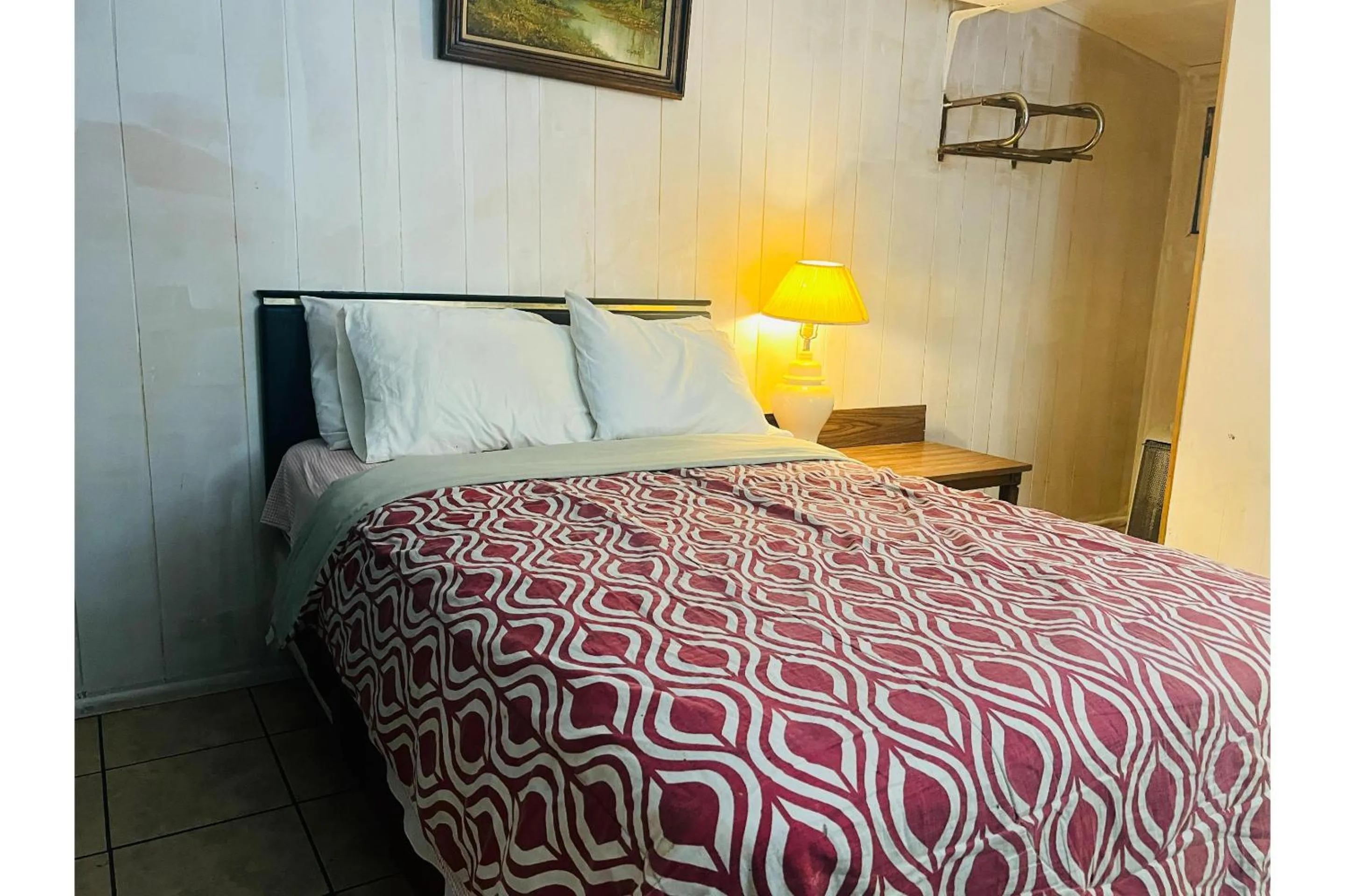 Bedroom in Capital O Sparta Motel Near Carbondale