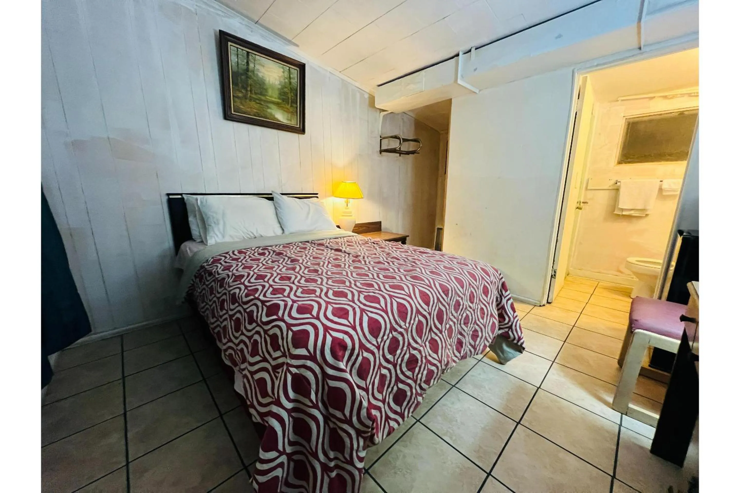 Bedroom in Capital O Sparta Motel Near Carbondale