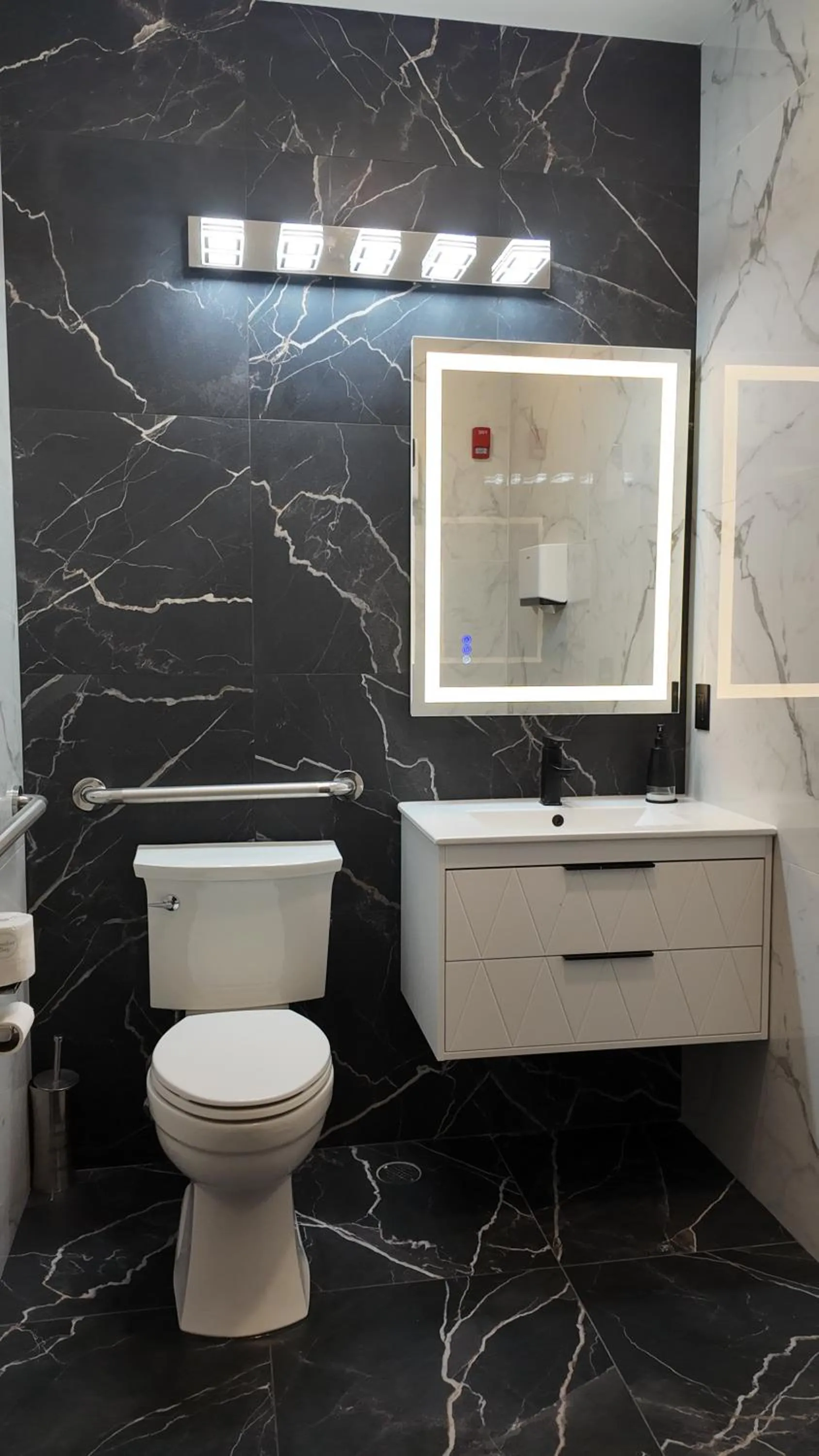 Bathroom in Super 8 by Wyndham Hampshire IL