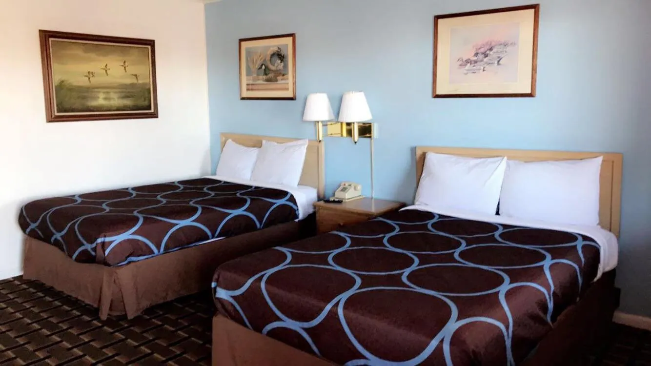 Bed in Village Inn Salina