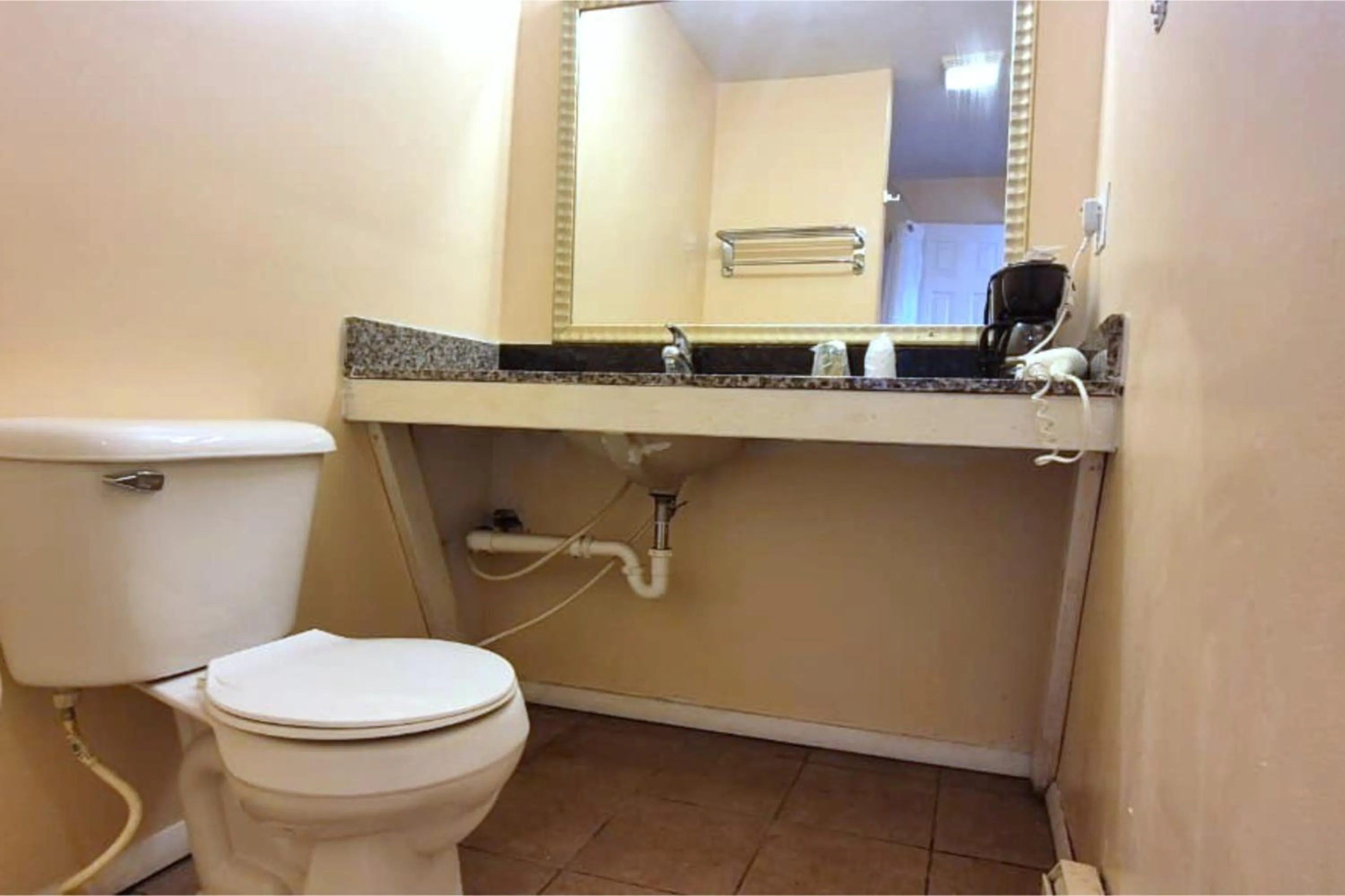 Bathroom in Canton Inn By OYO