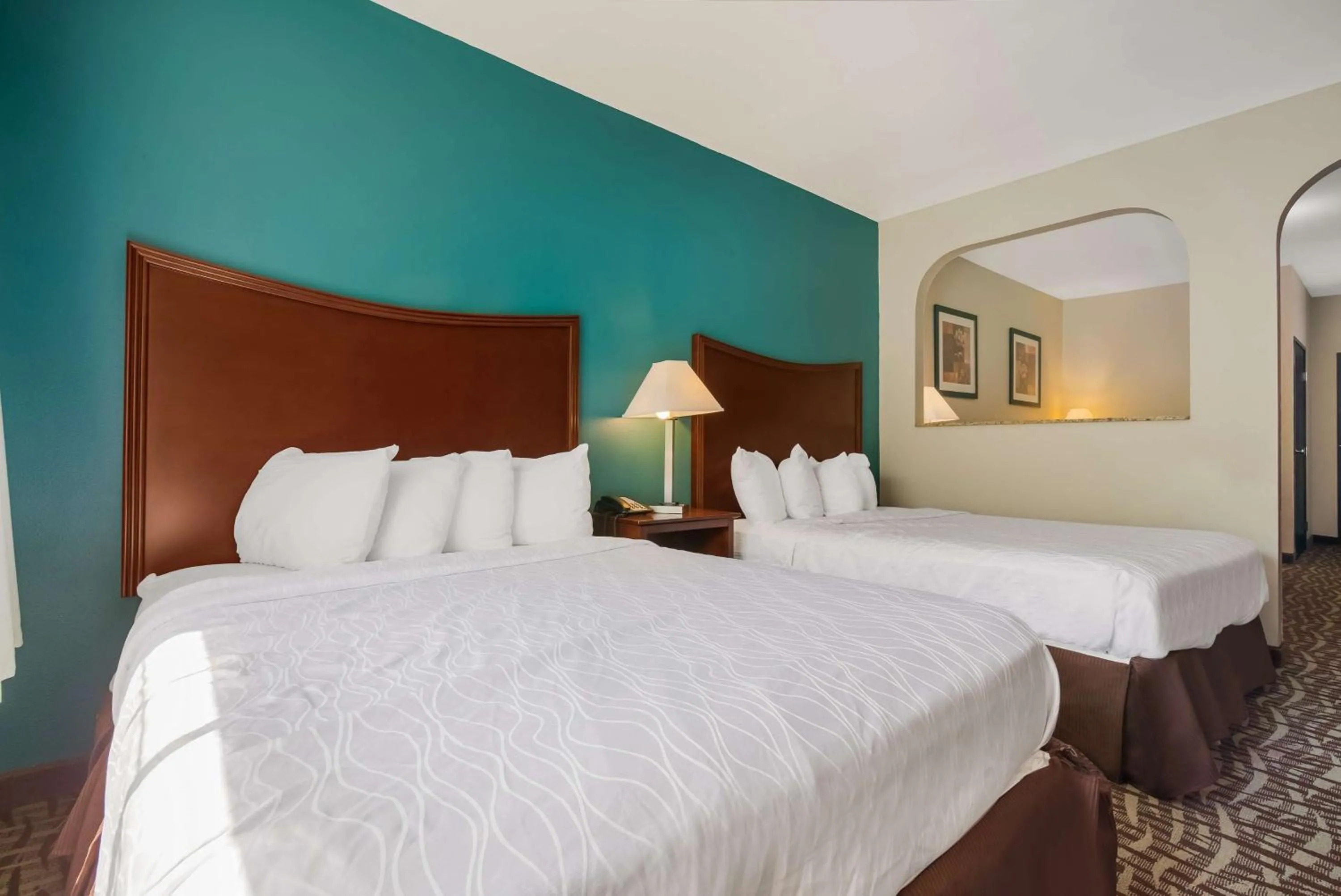 Bedroom, Bed in SureStay Plus Hotel by Best Western Topeka