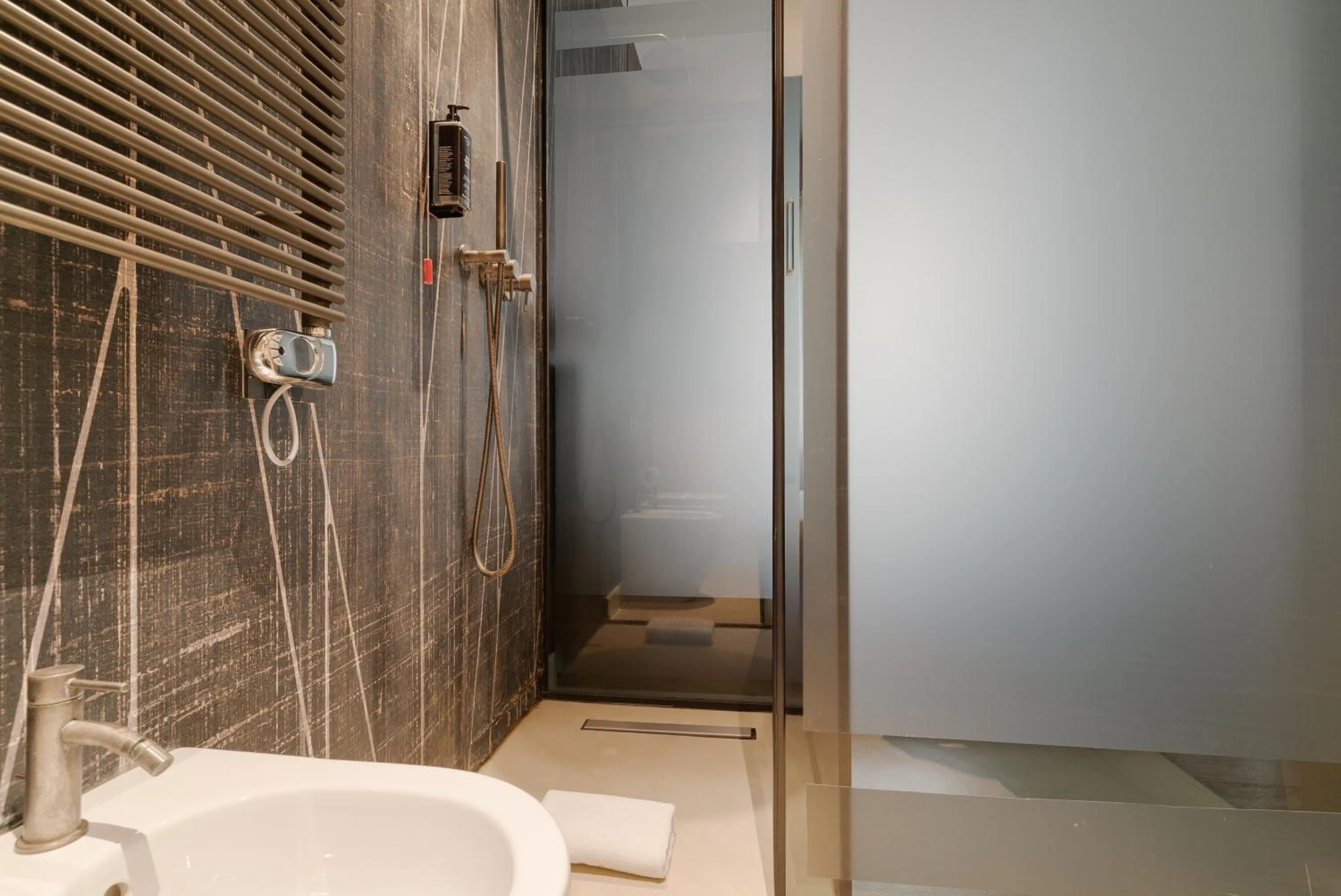 Bathroom in Della Spiga Suites by Brera Apartments