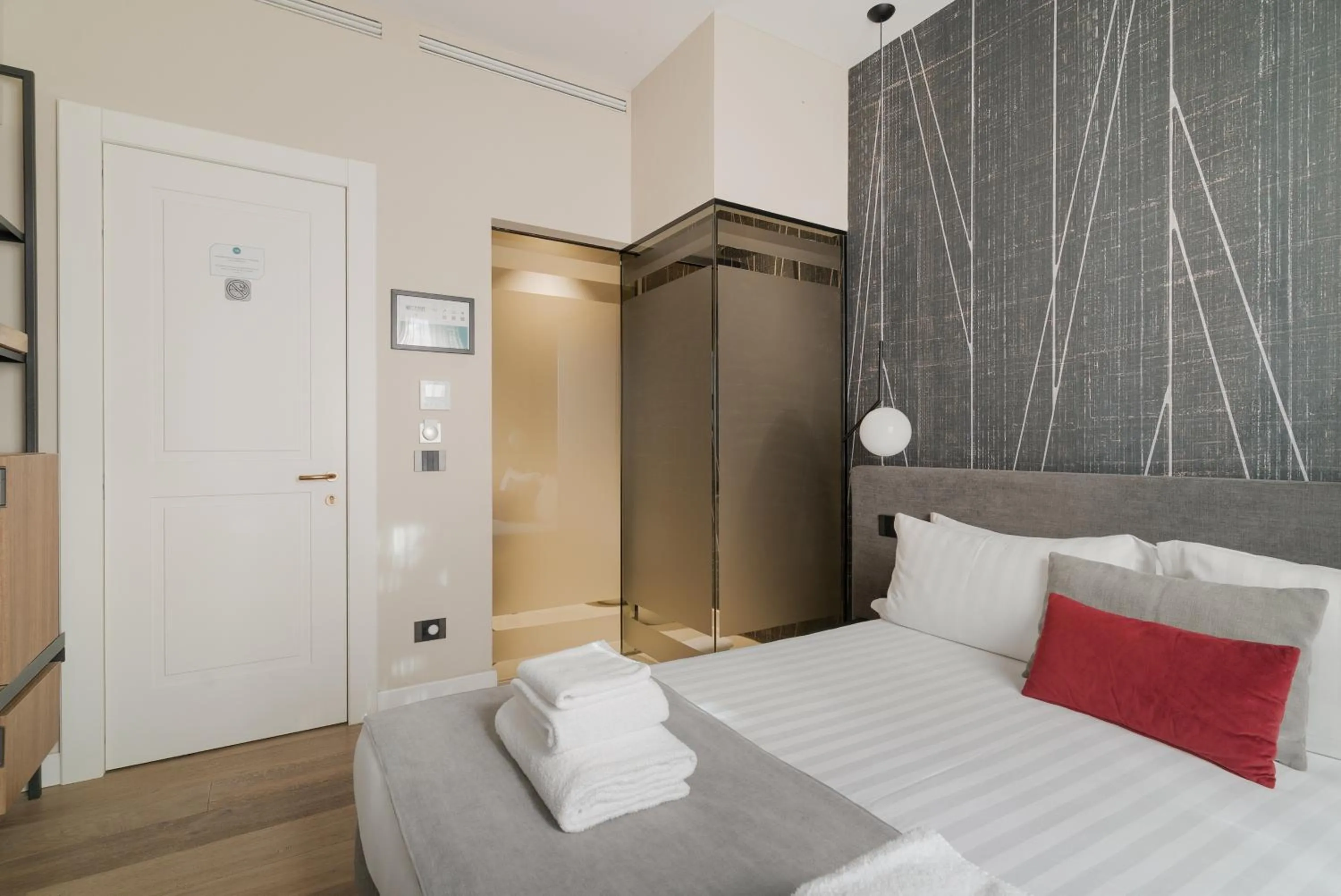 Photo of the whole room, Bed in Della Spiga Suites by Brera Apartments