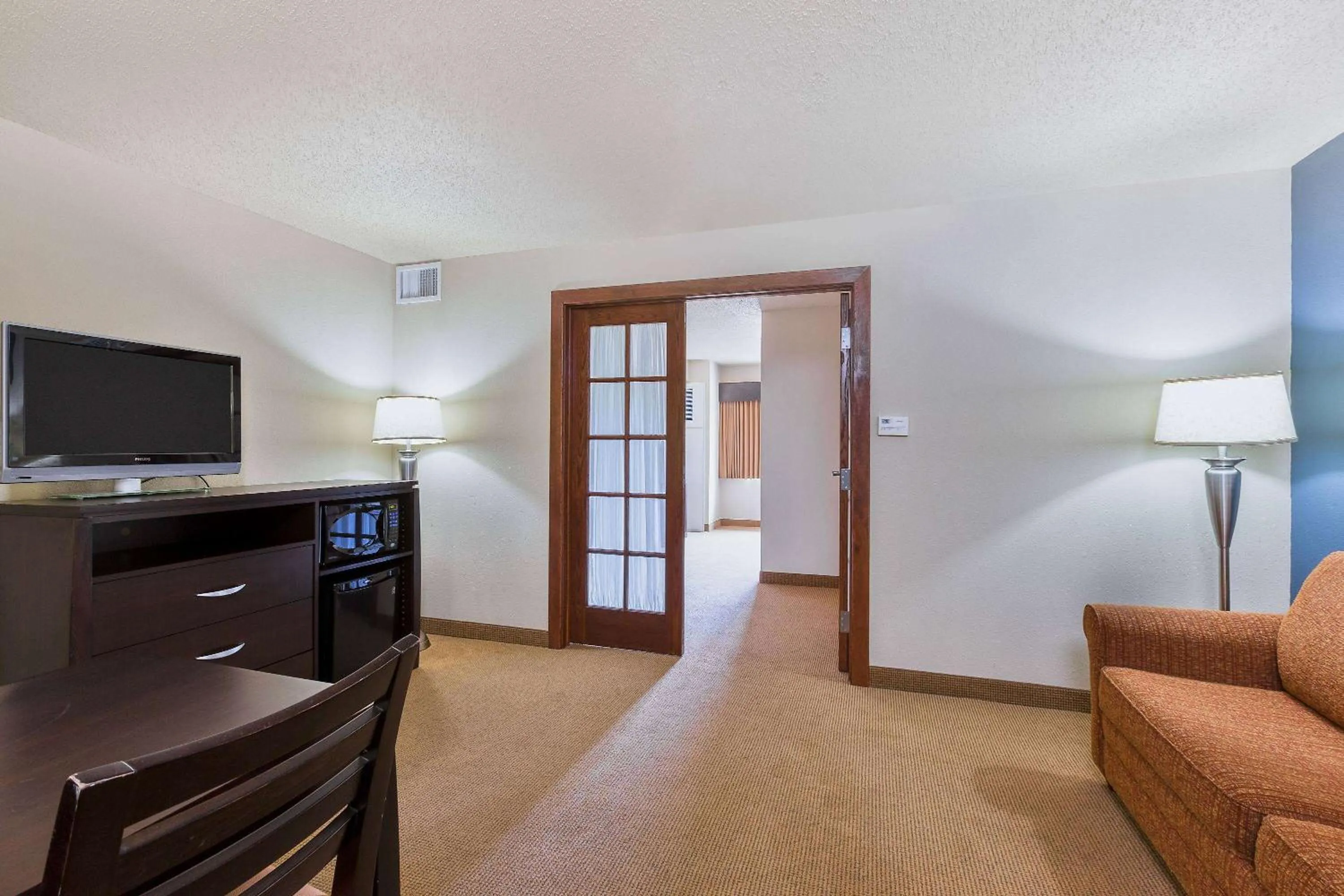 Living room in AmericInn by Wyndham Monmouth