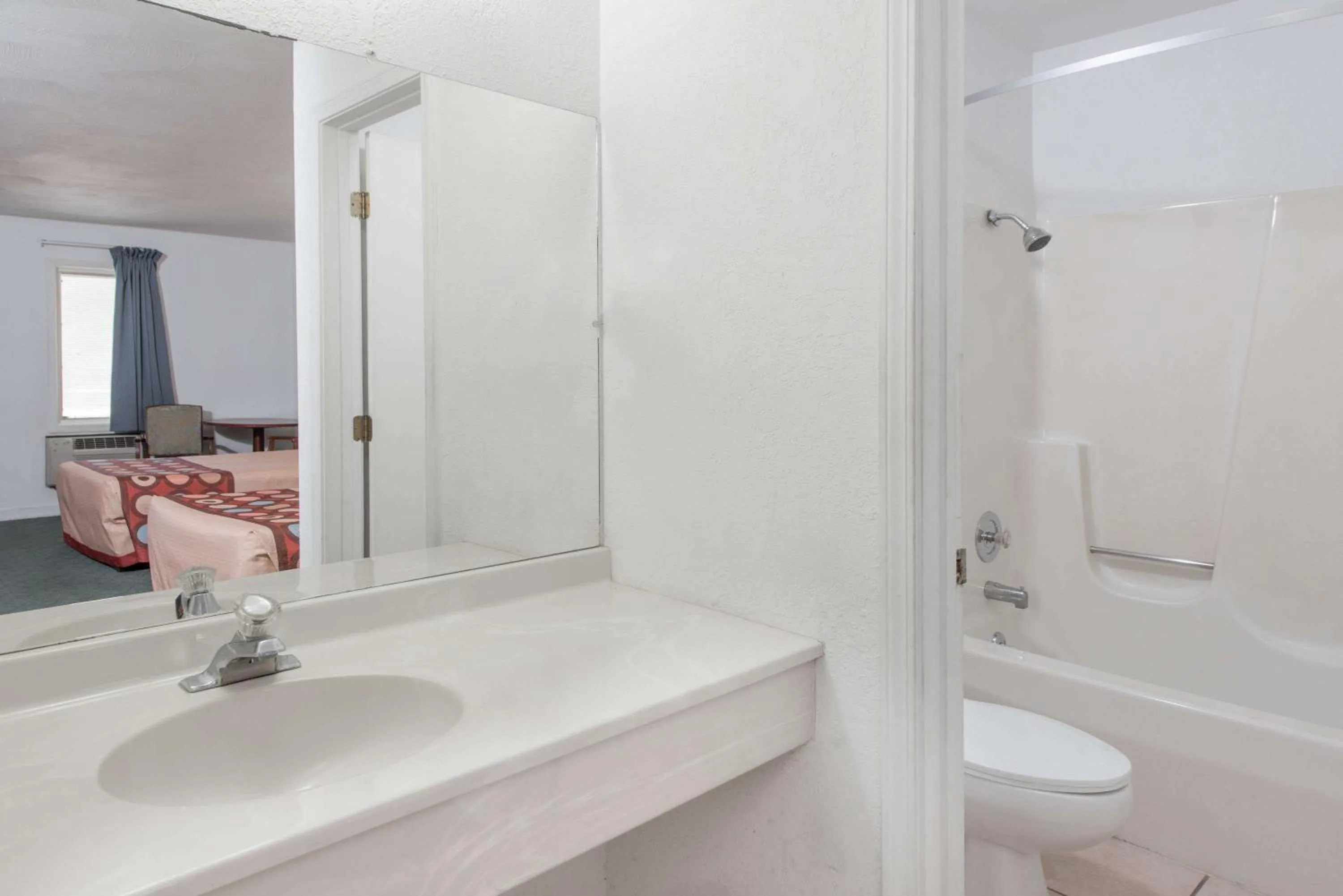 Bathroom in Super 8 by Wyndham Taylorville IL