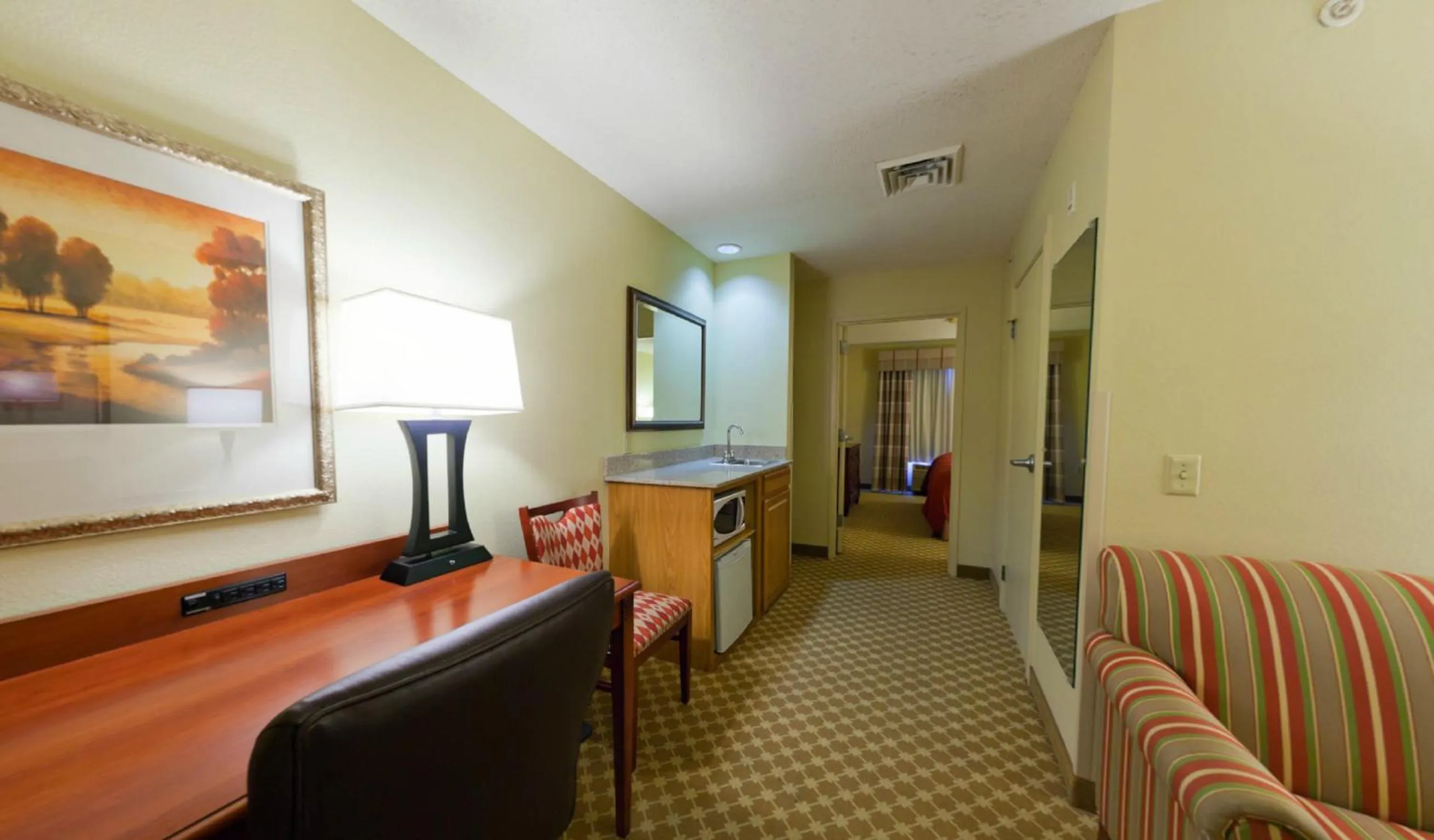 Seating area in Country Inn & Suites by Radisson, Rock Falls, IL