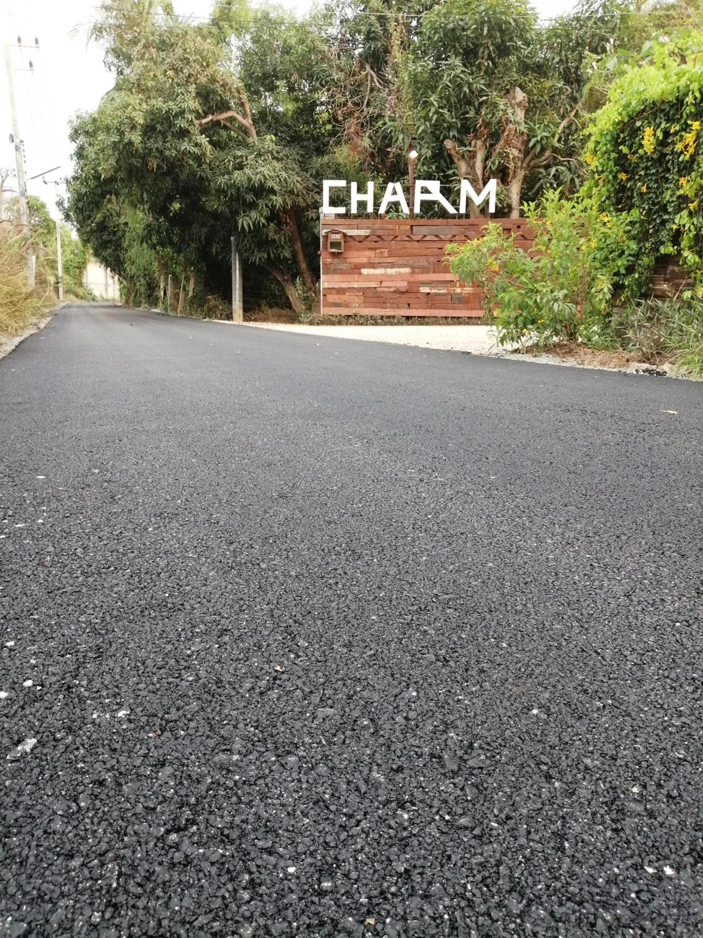 Property logo or sign in Rustic​ Charm​ Suphan​