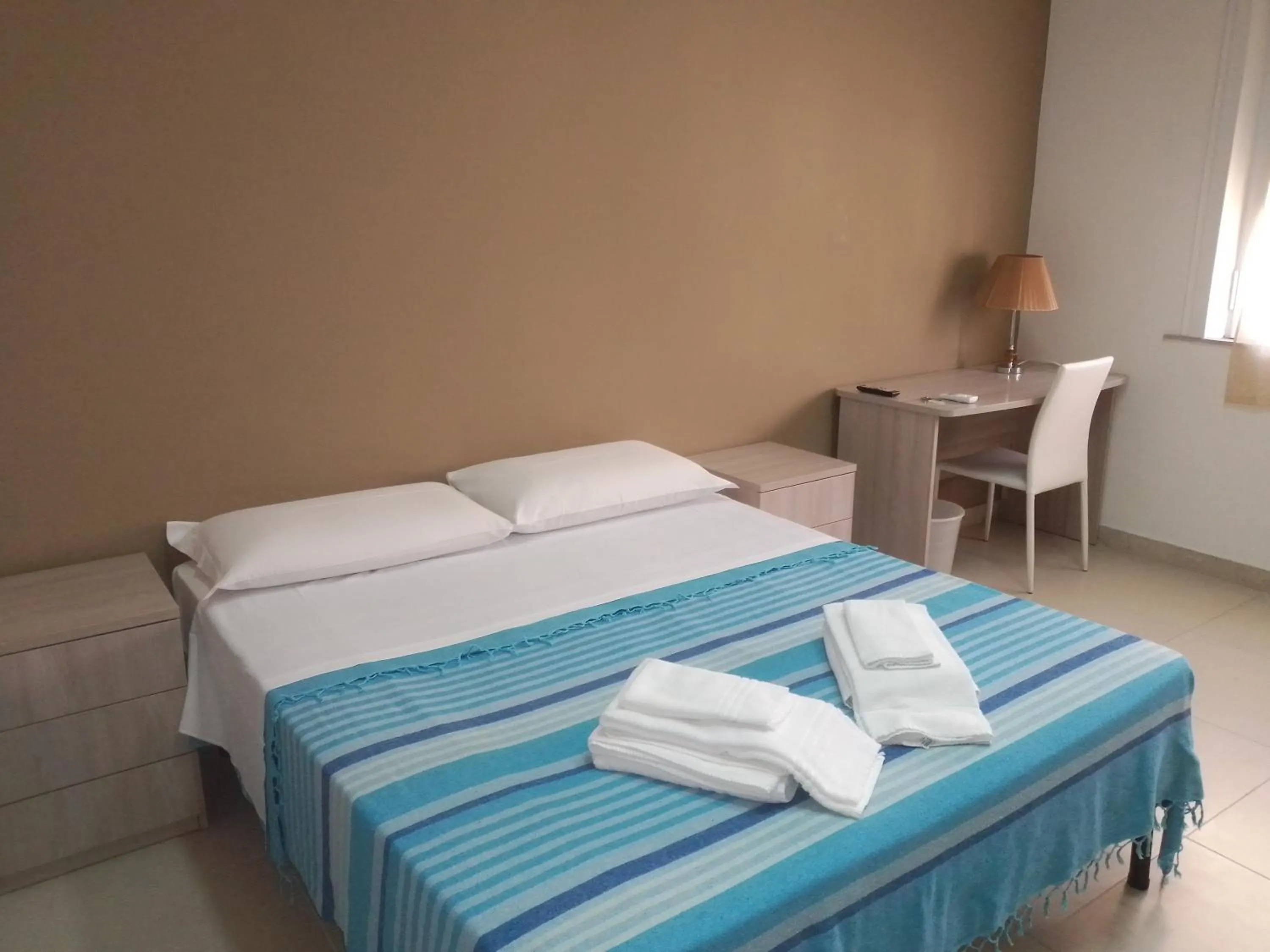 Bed in MAGNA GRECIA B&B