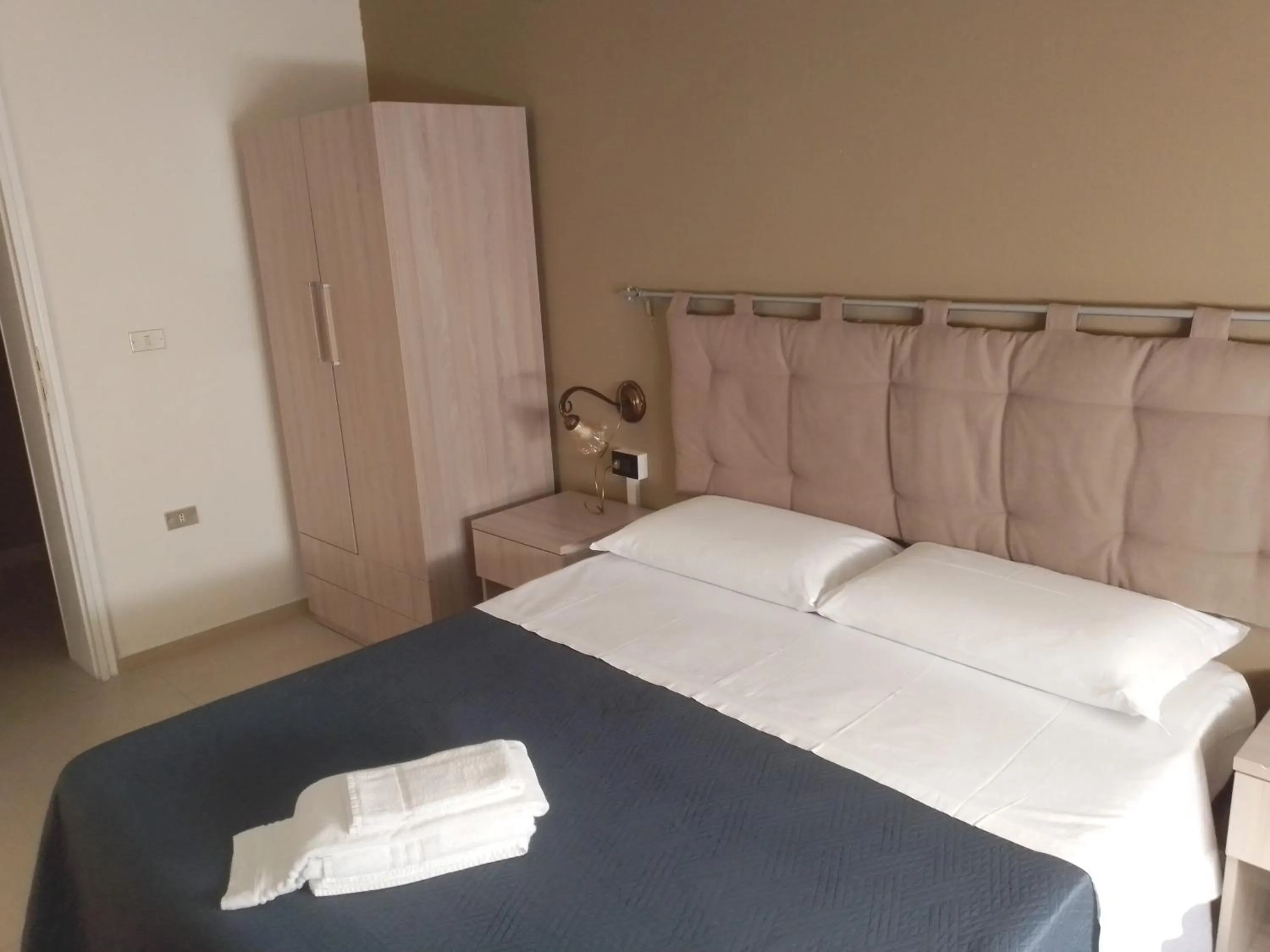 Bed in MAGNA GRECIA B&B