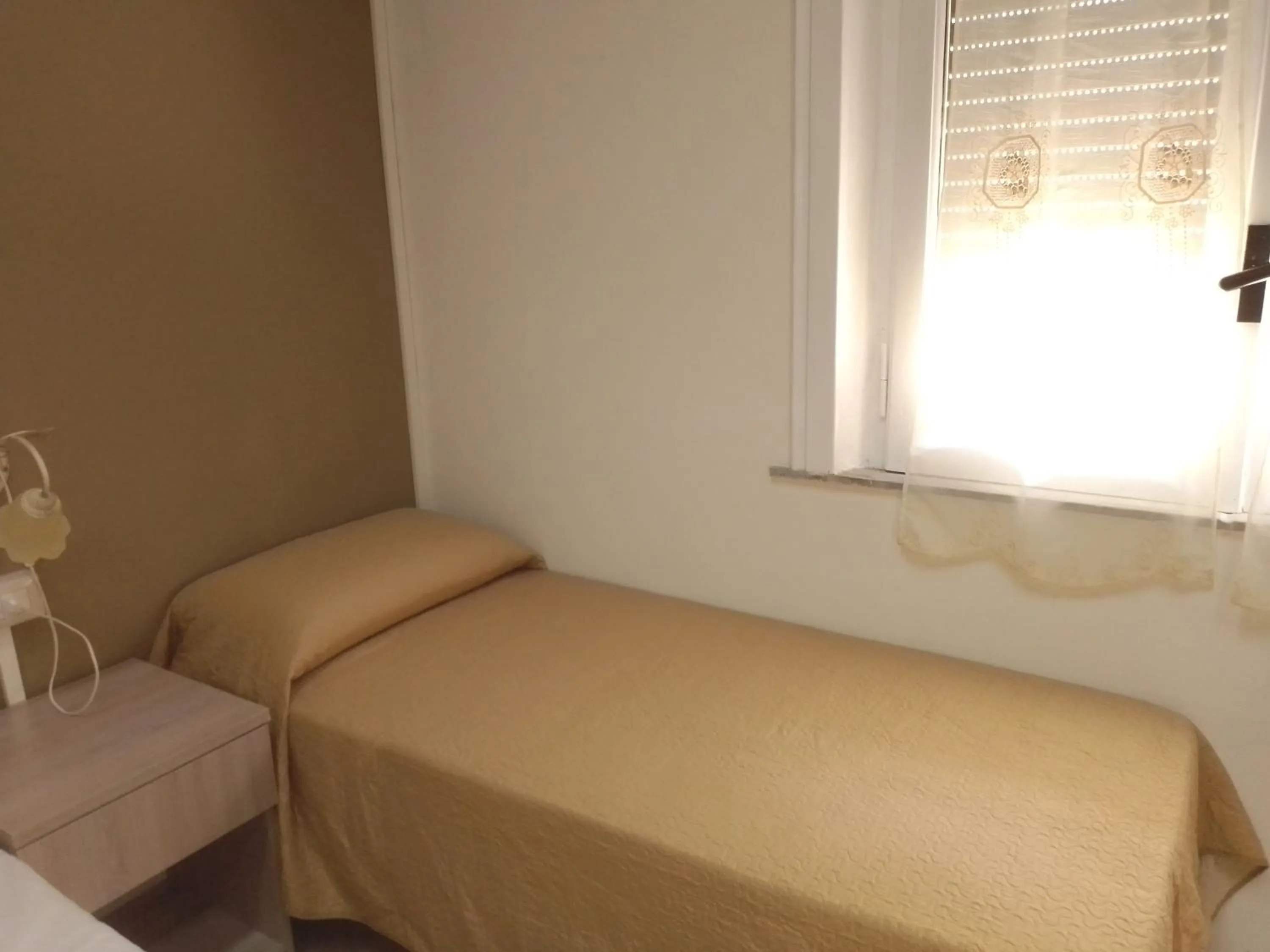 Bed in MAGNA GRECIA B&B