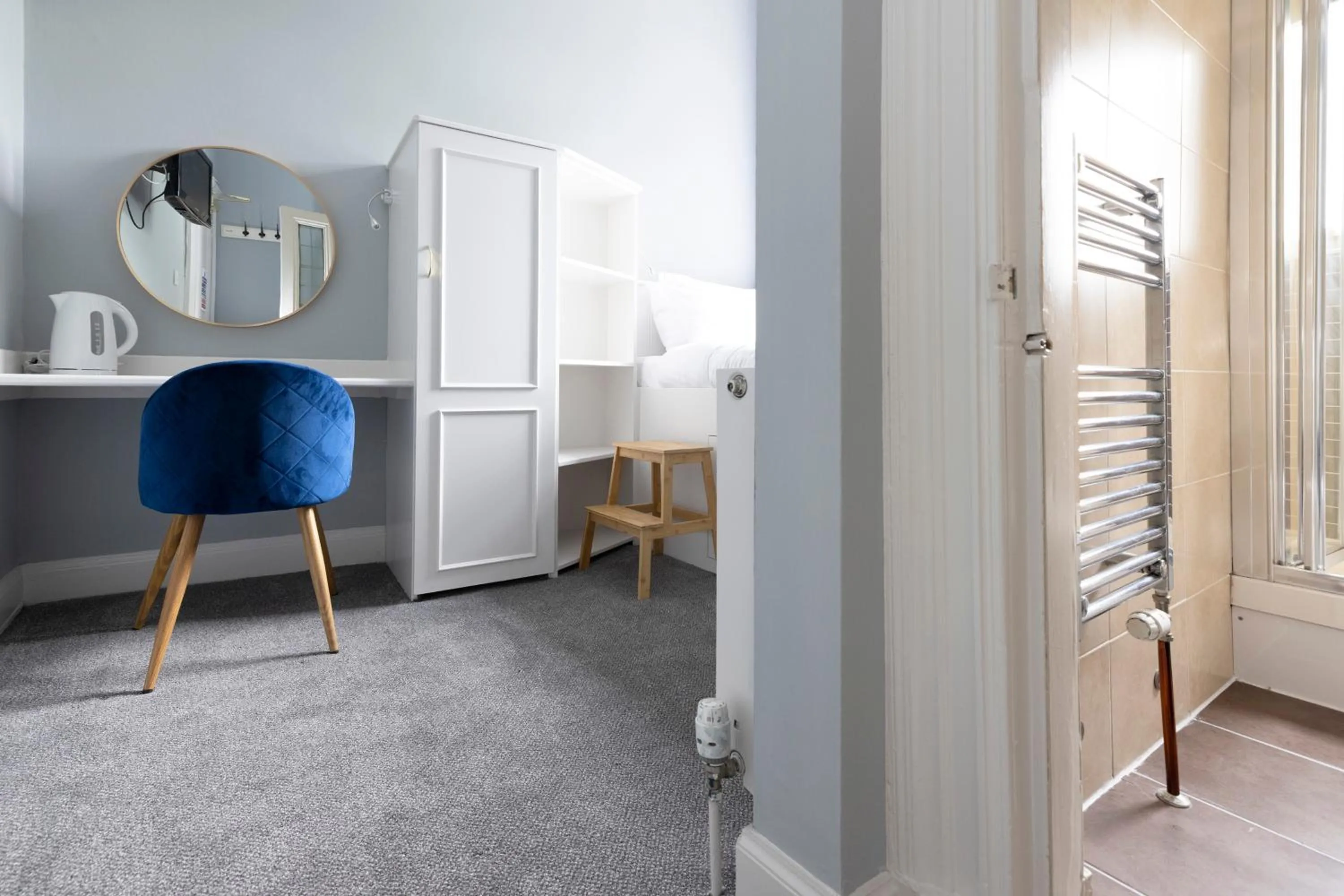 Seating area, Bed in JOIVY Haymarket