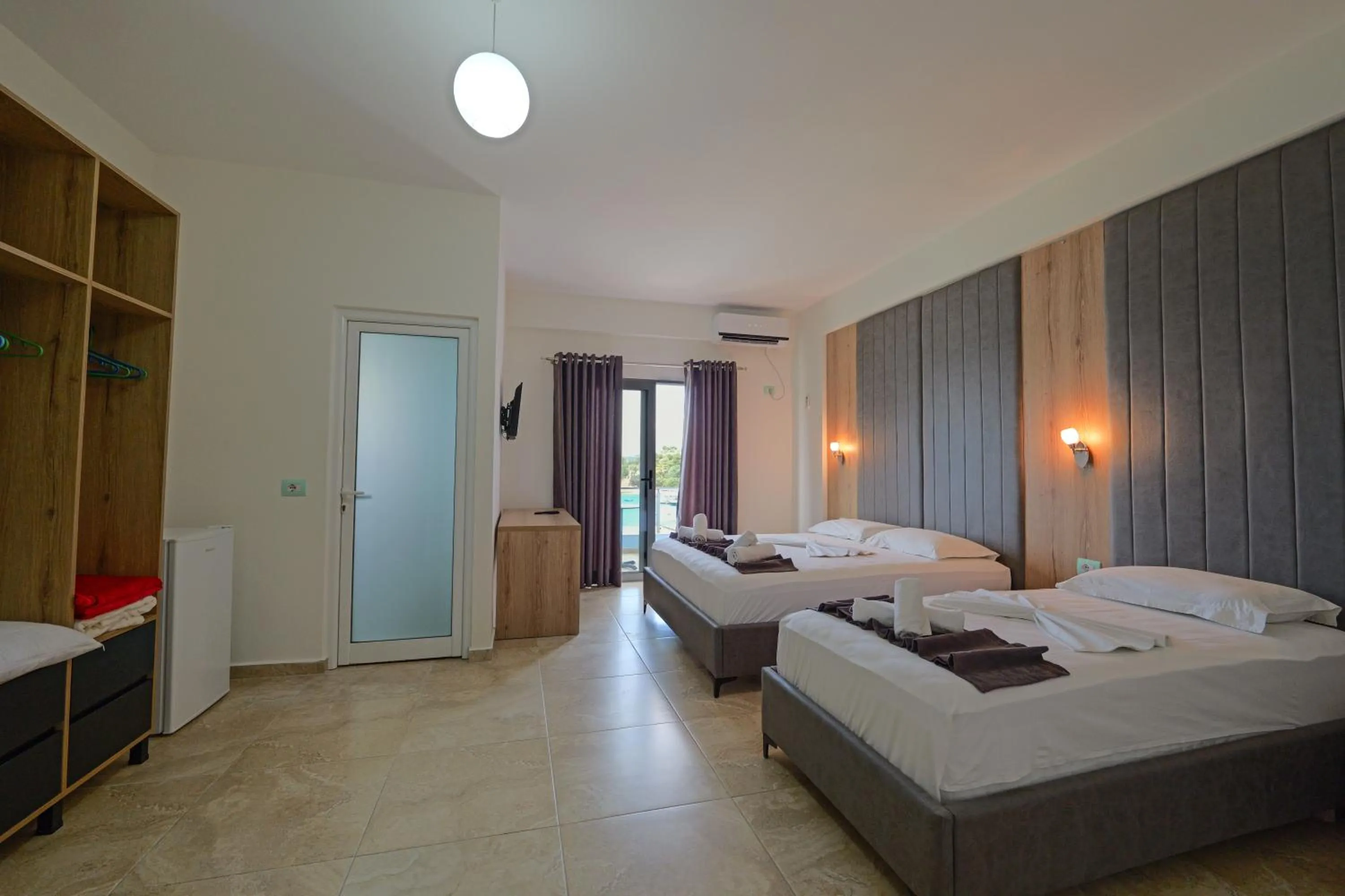 Photo of the whole room, Bed in Hotel Esmerald Ksamil