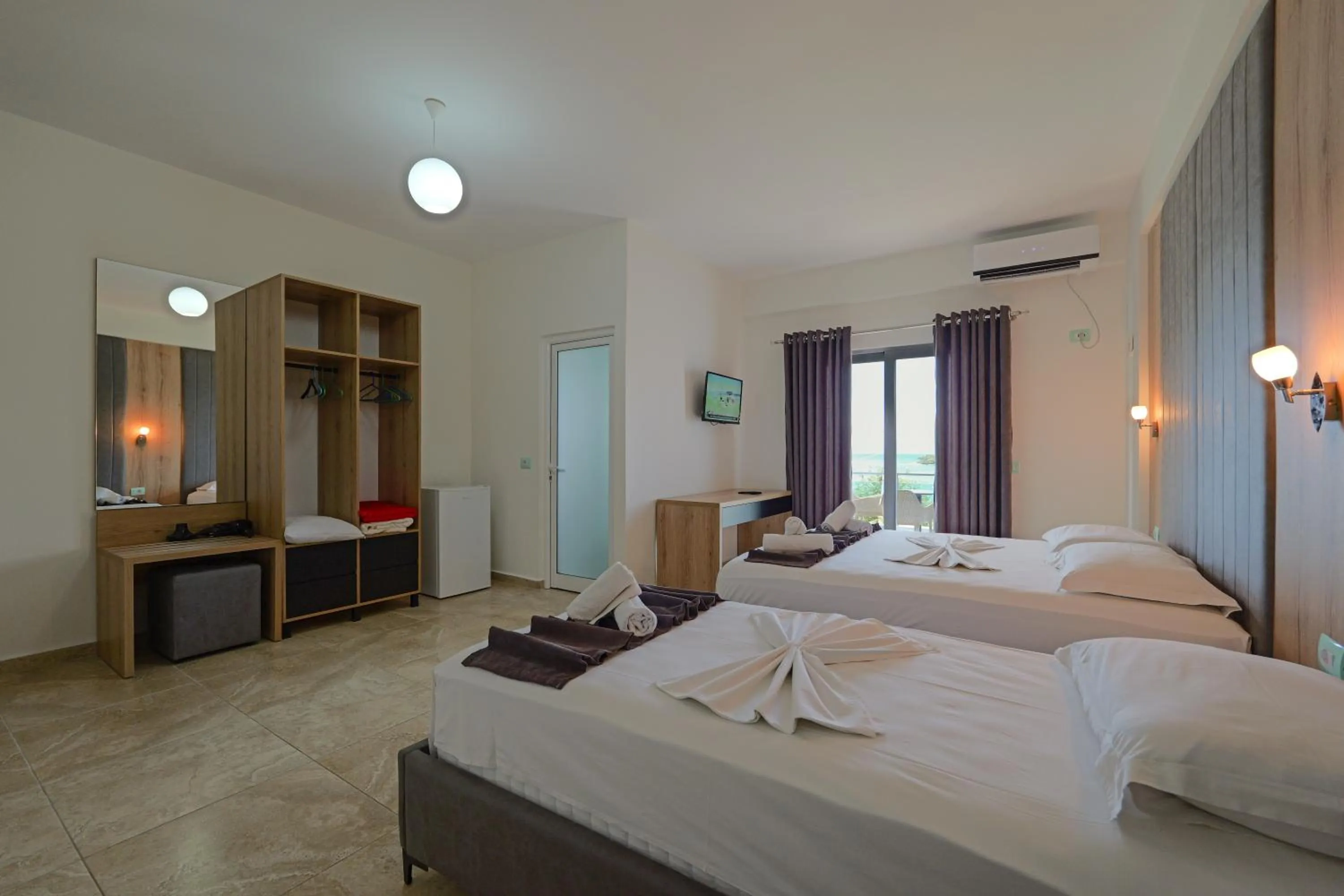 Photo of the whole room, Bed in Hotel Esmerald Ksamil