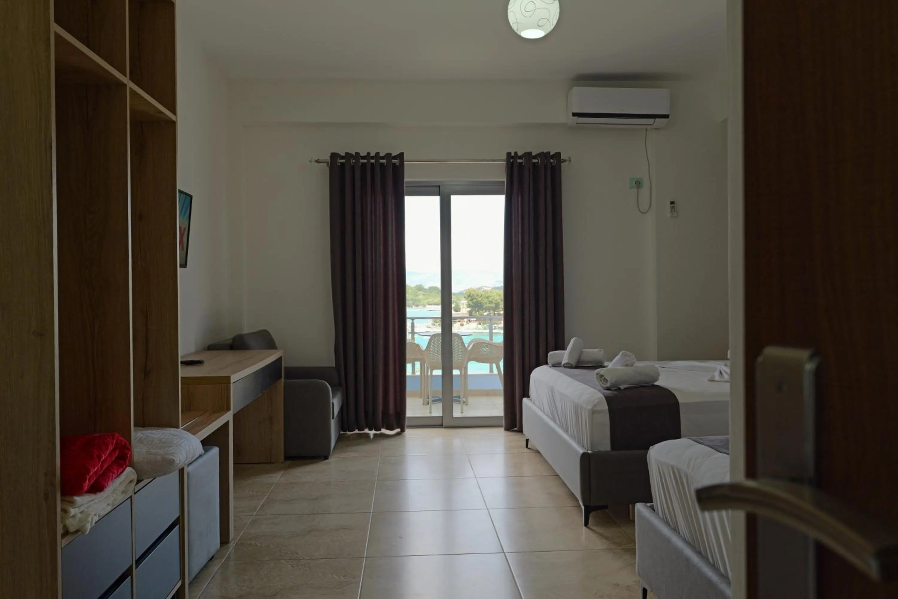 Photo of the whole room, Bed in Hotel Esmerald Ksamil