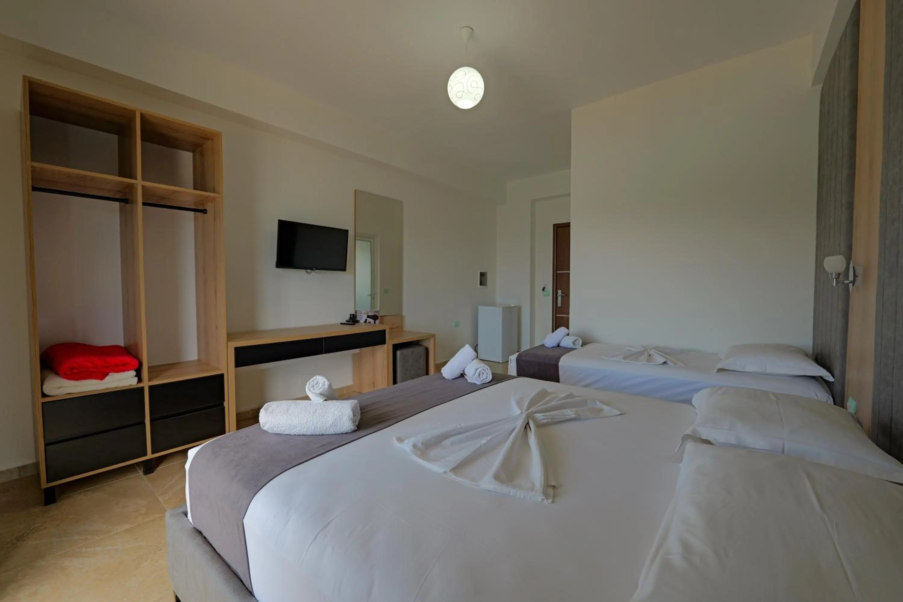 Photo of the whole room, Bed in Hotel Esmerald Ksamil