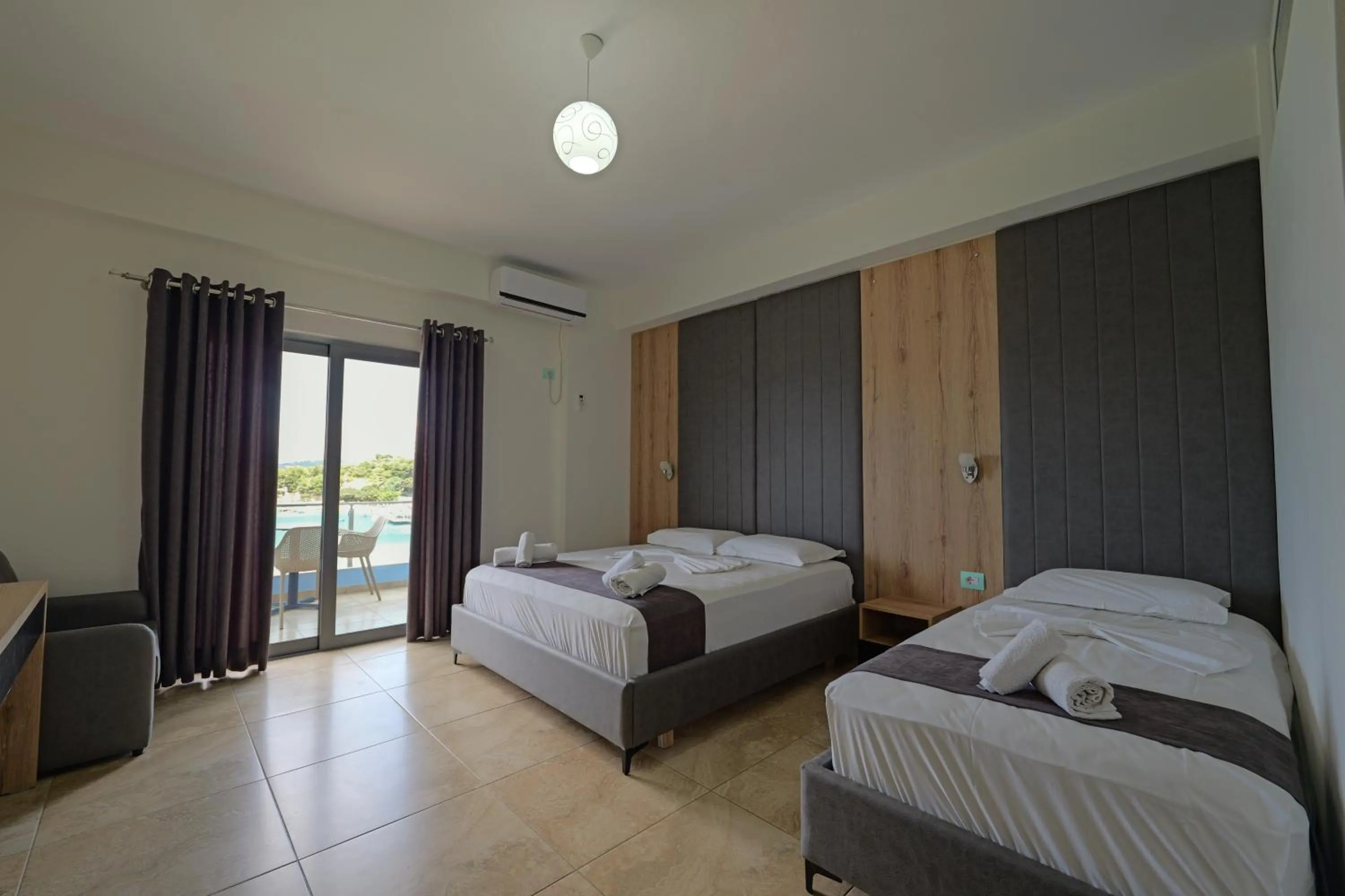 Photo of the whole room, Bed in Hotel Esmerald Ksamil