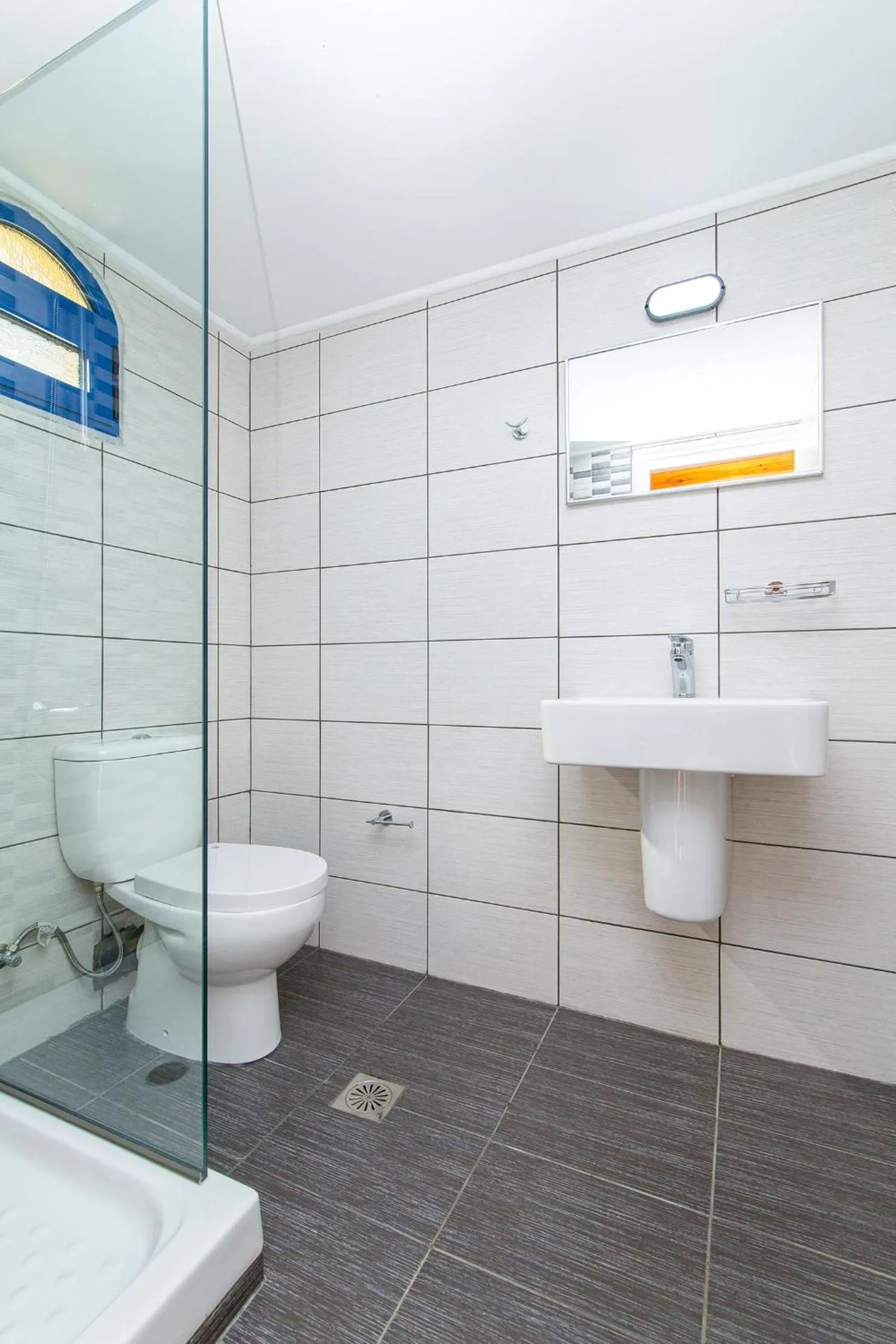 Bathroom in Dionysos Apartments & Studios