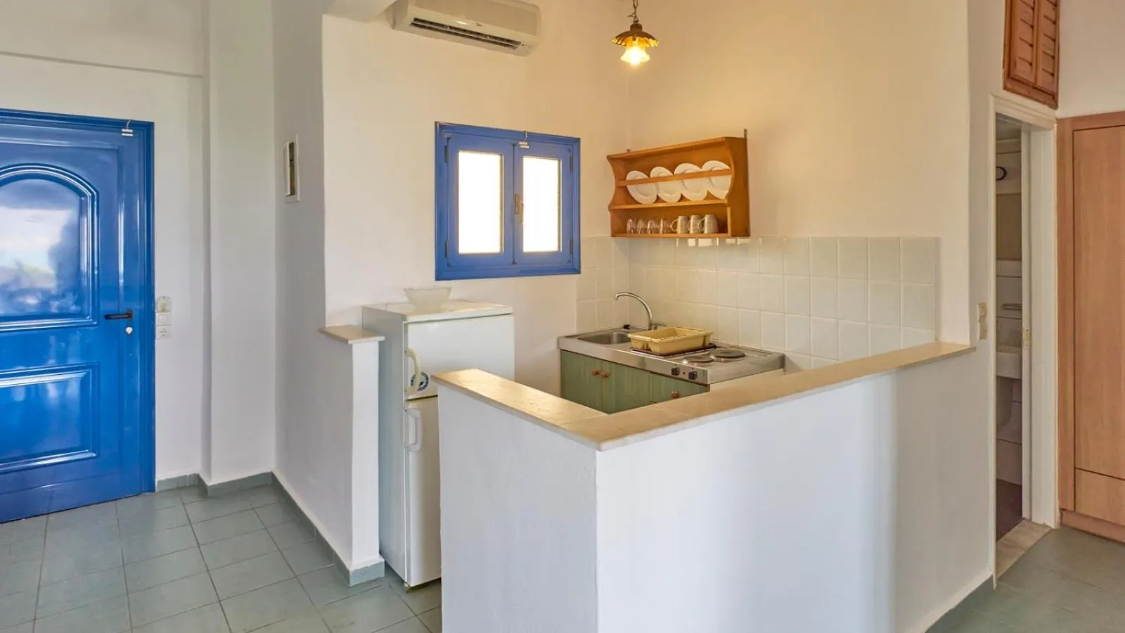 Kitchen or kitchenette in Dionysos Apartments & Studios