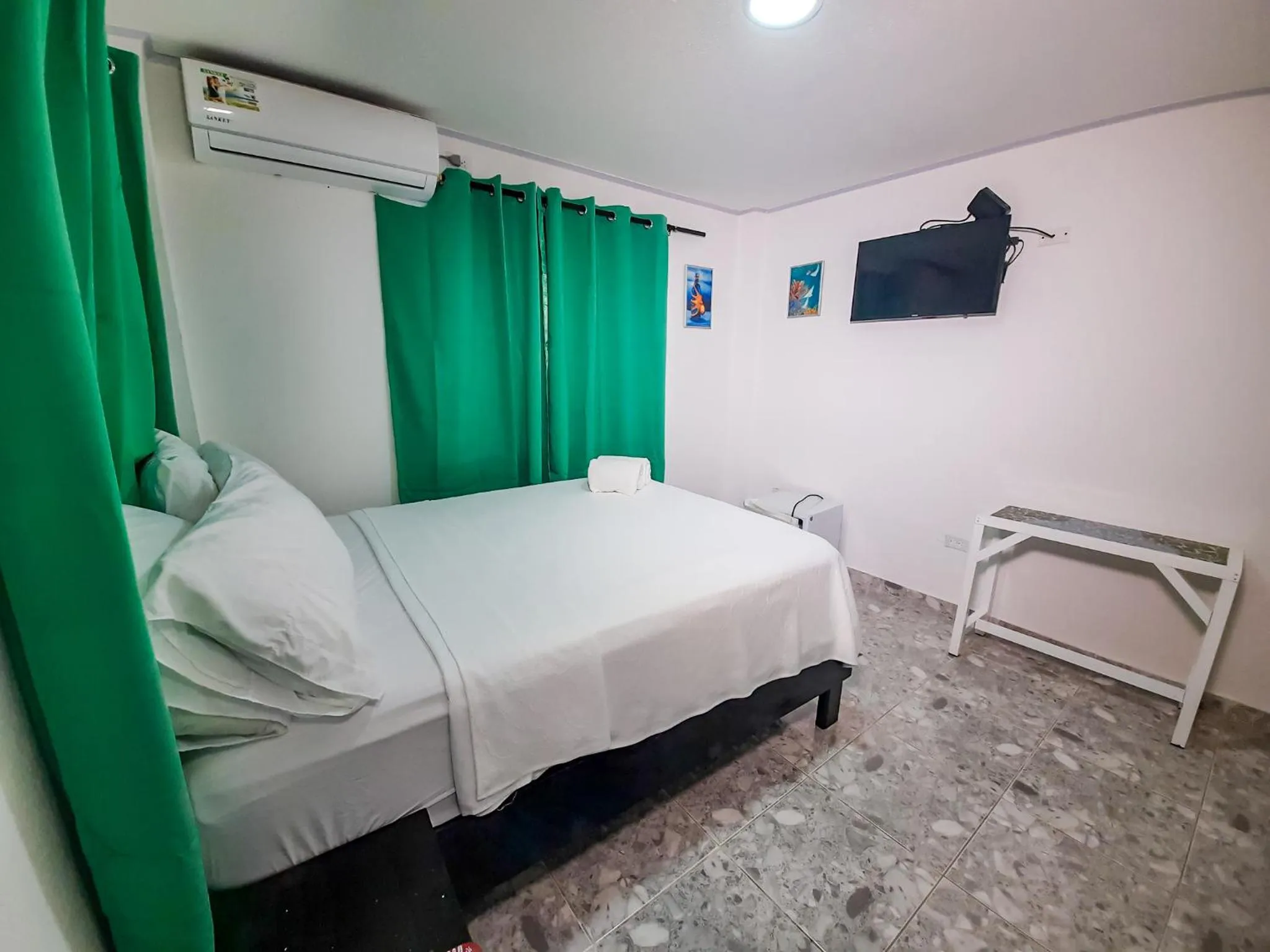 Bed in Hotel Posada Enilda