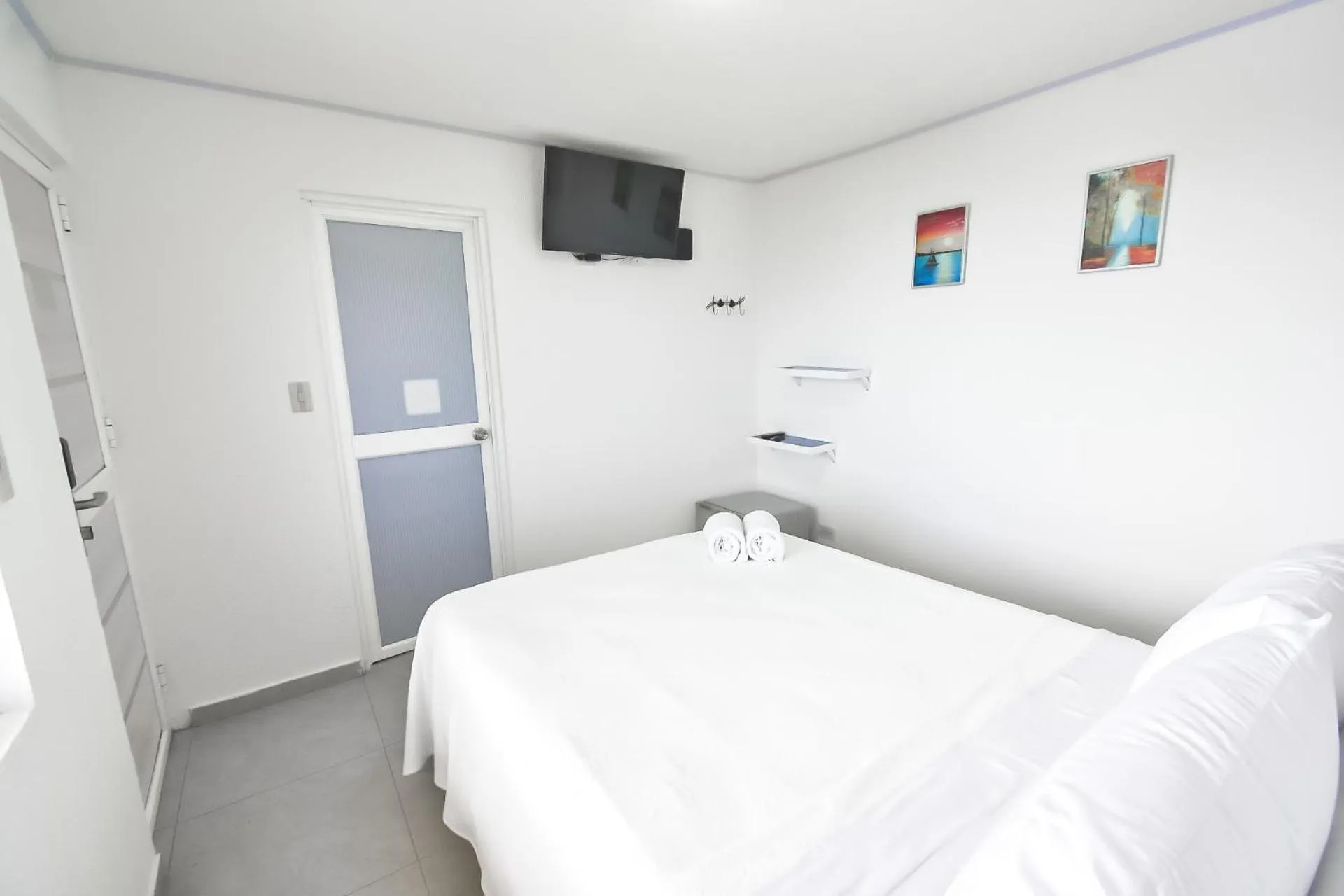 Bed in Hotel Posada Enilda