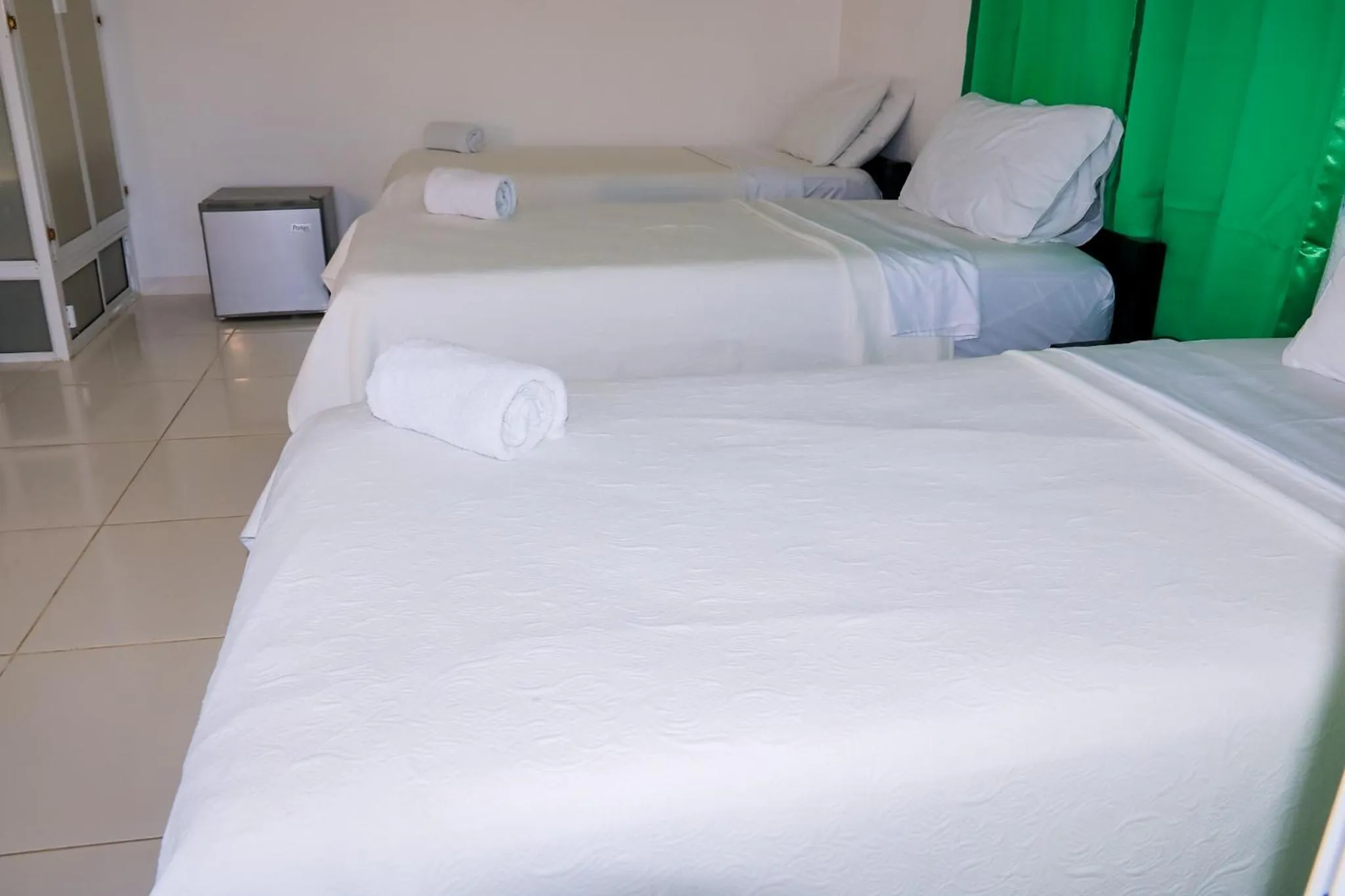 Bed in Hotel Posada Enilda