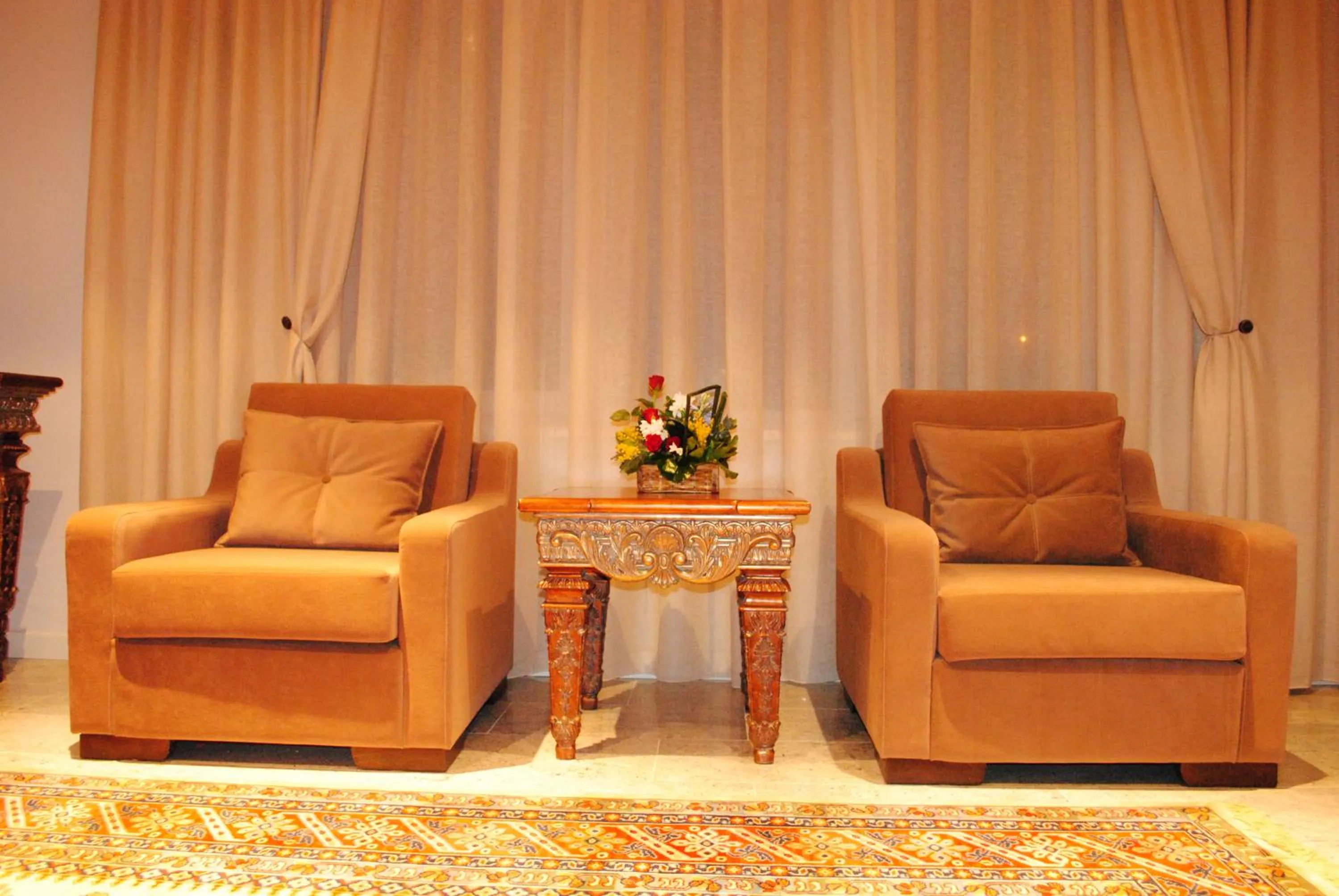 Communal lounge/ TV room in Hotel Vila 60