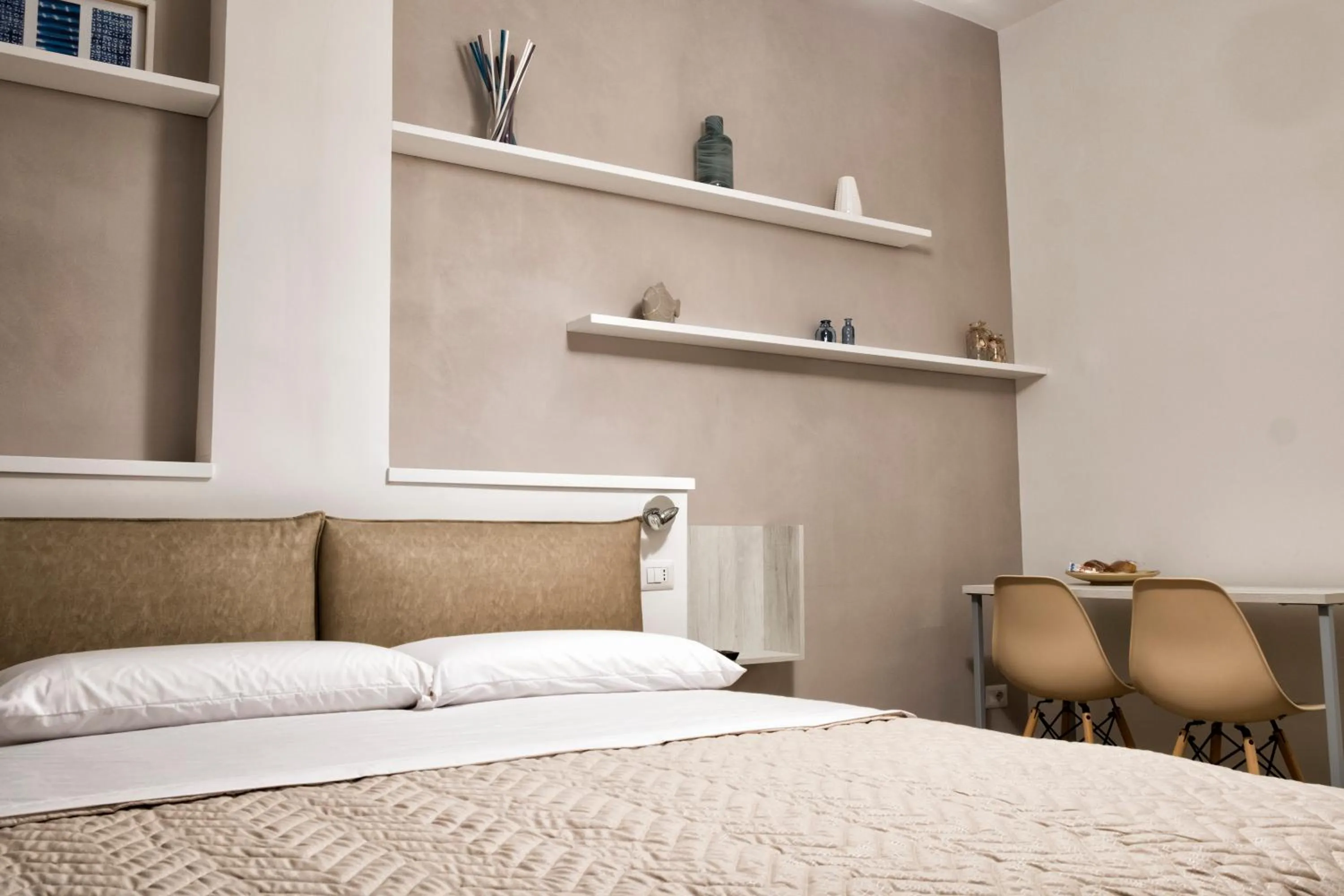 Bed in DIMORA FLEGREA room & breakfast