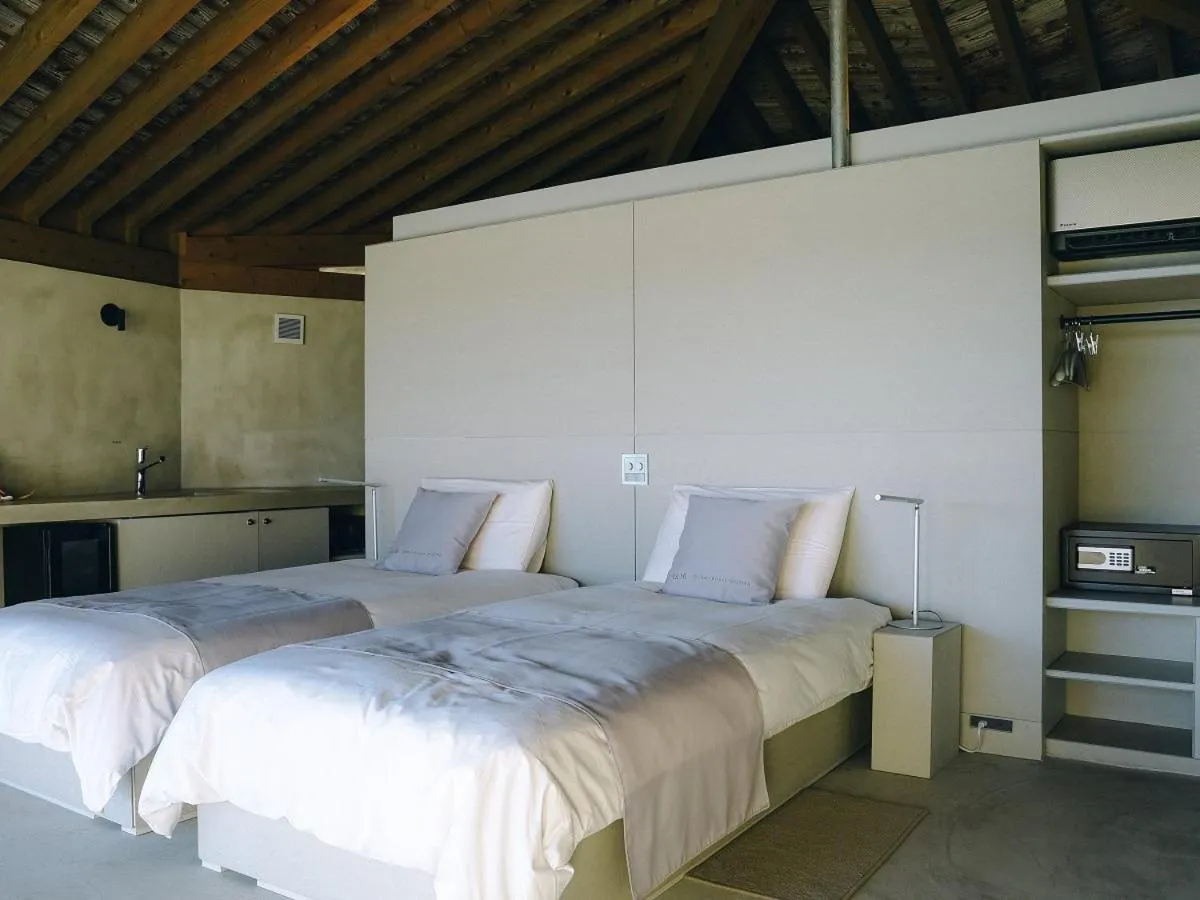 Bed in Denpaku The Beachfront MIJORA