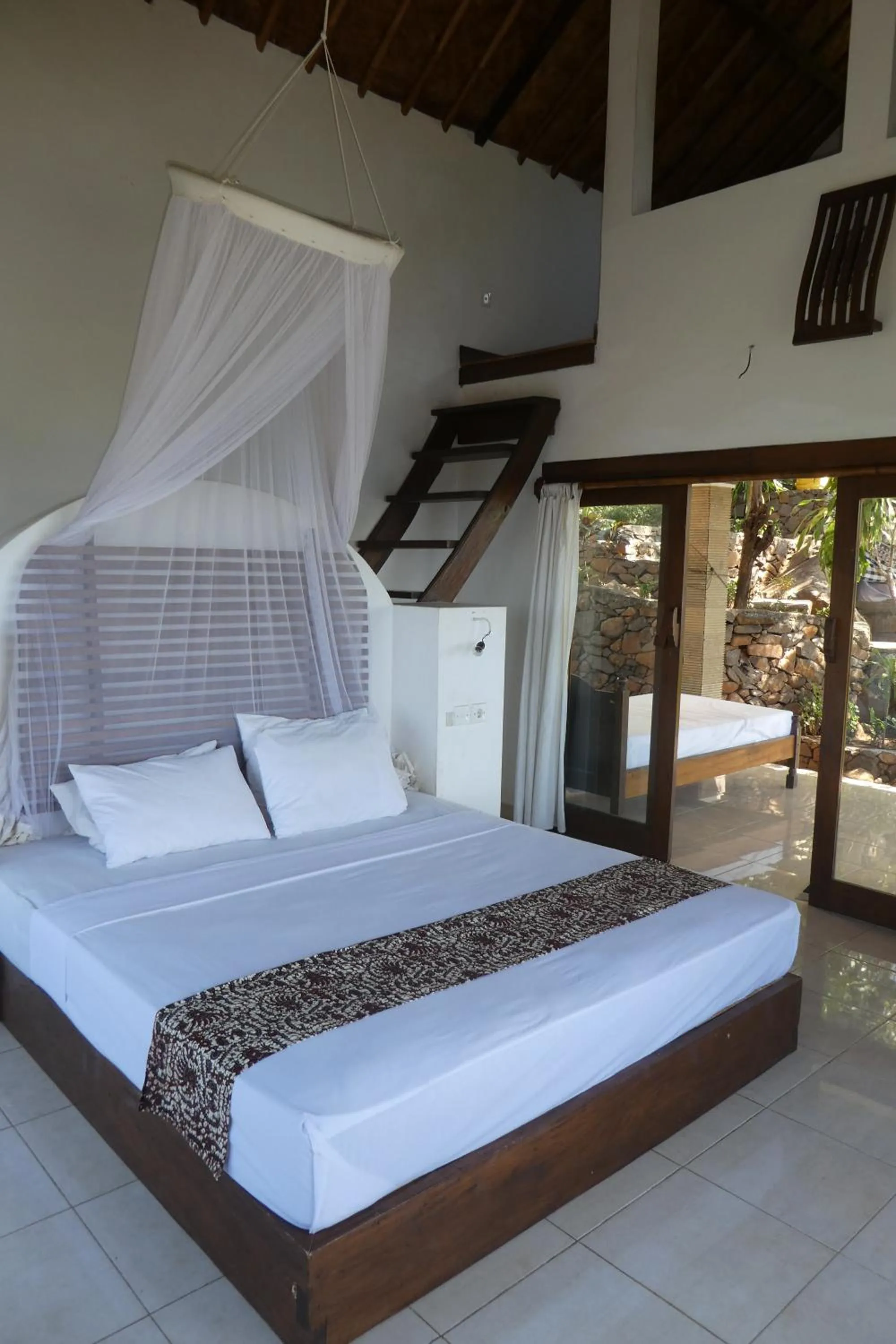 Photo of the whole room, Bed in Wawa Wewe Rock