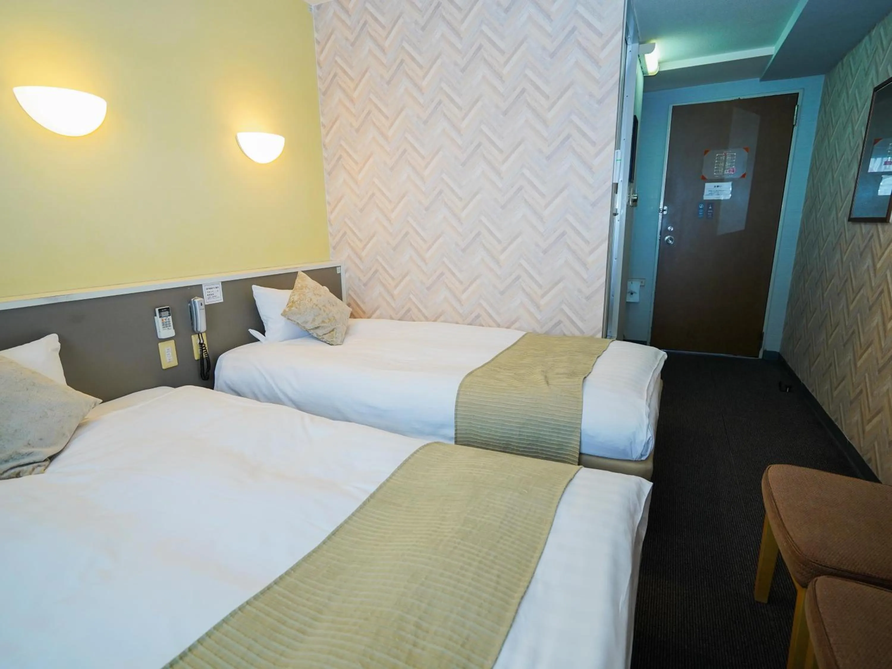 Photo of the whole room, Bed in Hotel AreaOne Okayama
