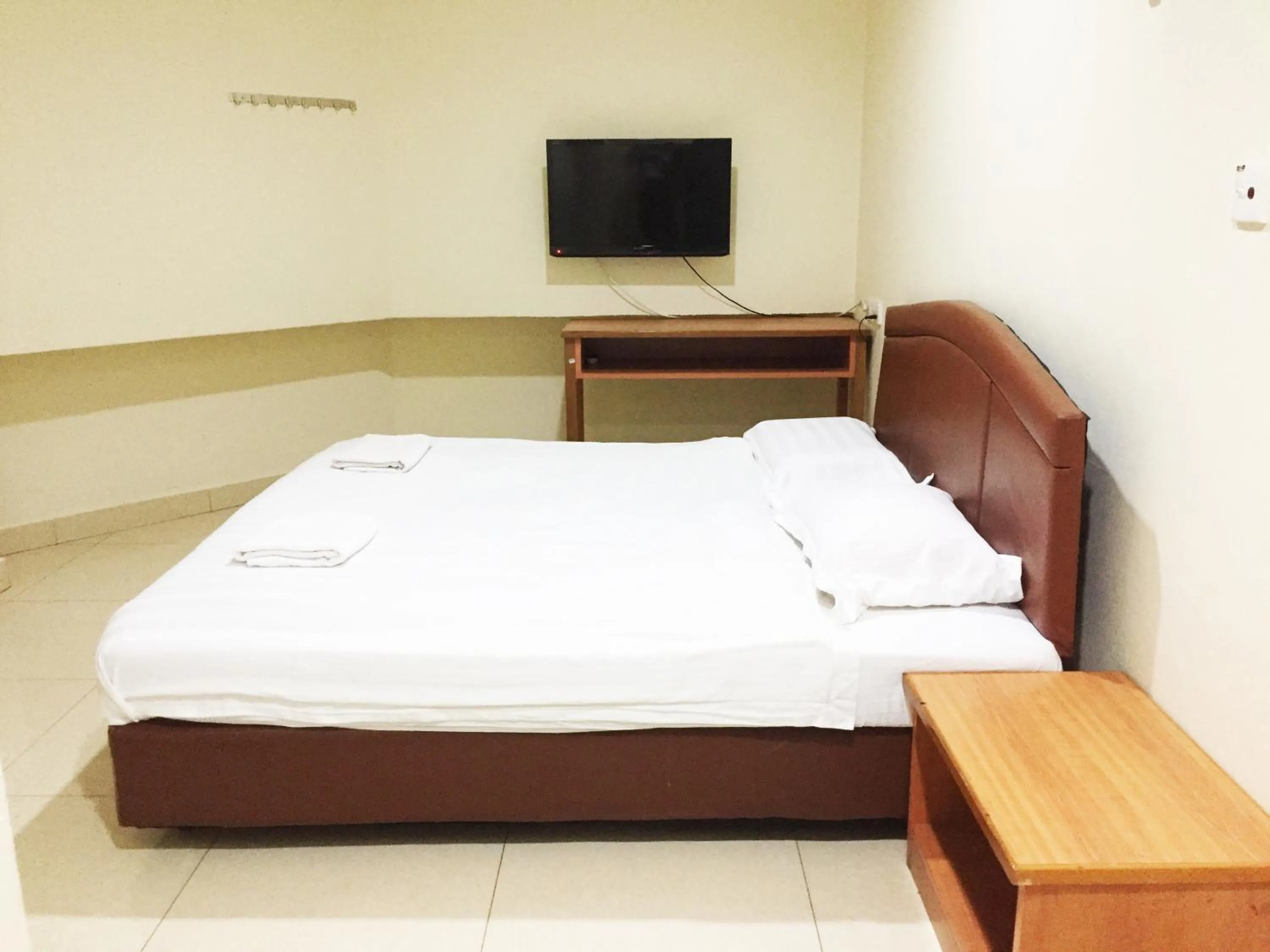 Bed in HK Inn Hua Kiew Inn