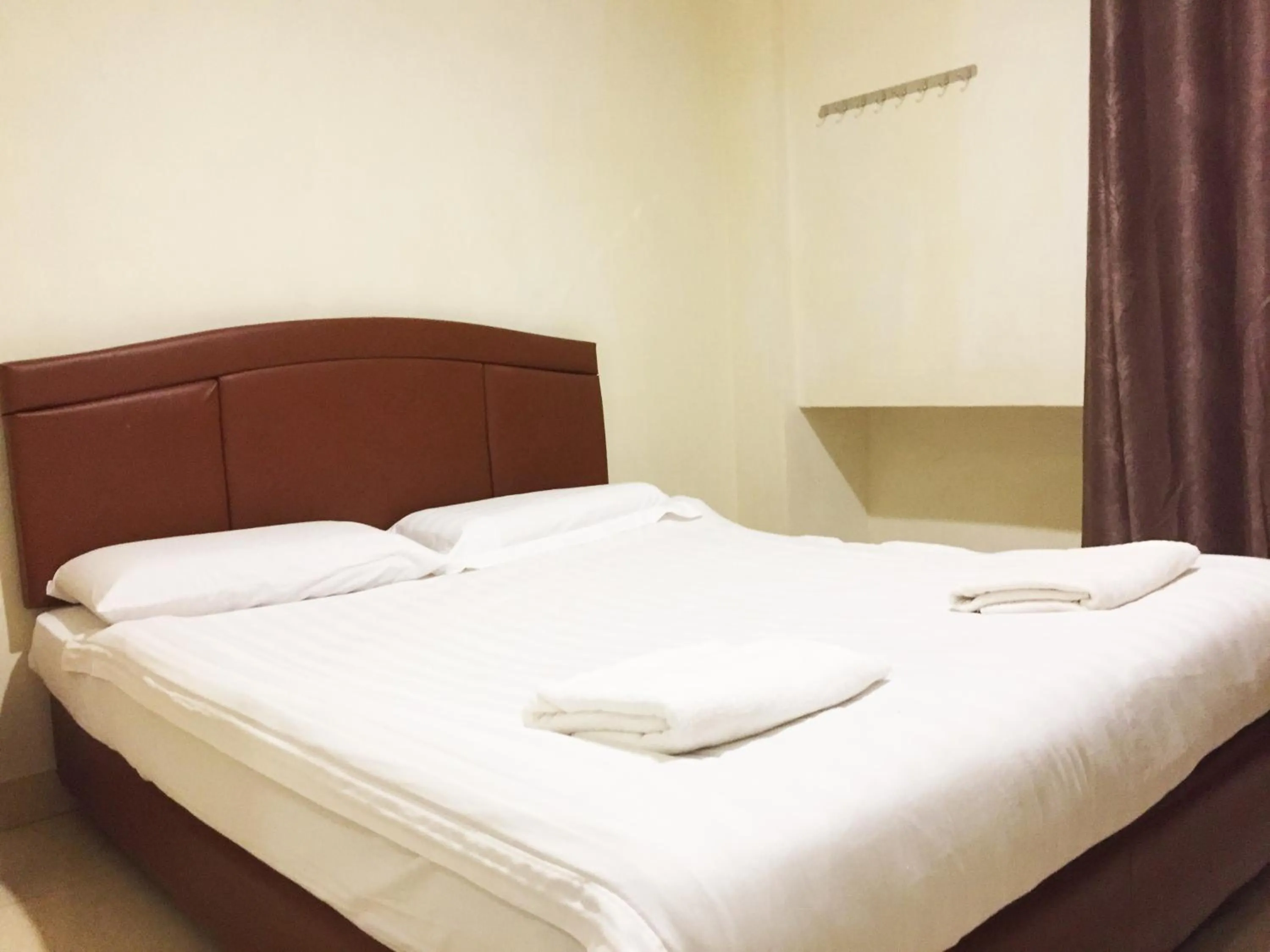 Bed in HK Inn Hua Kiew Inn