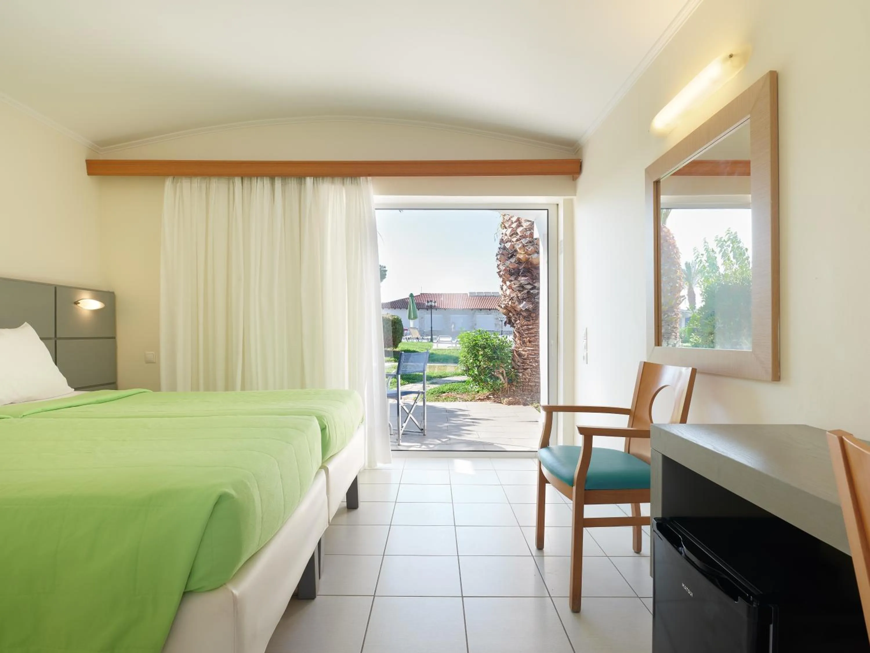 Bedroom, Bed in Kinetta Beach Resort and Spa