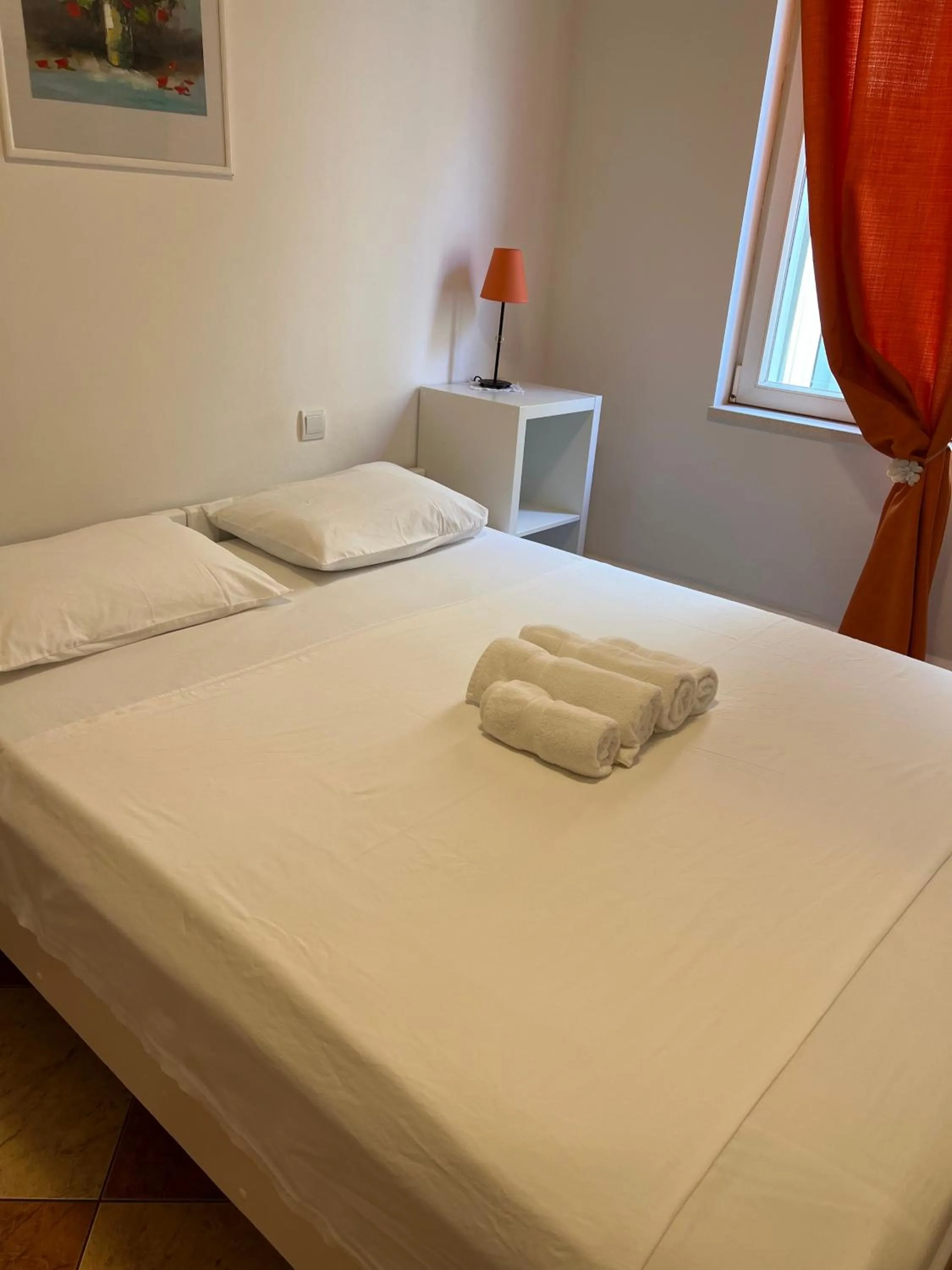 Bed in Apartments and Rooms Katija & Egon