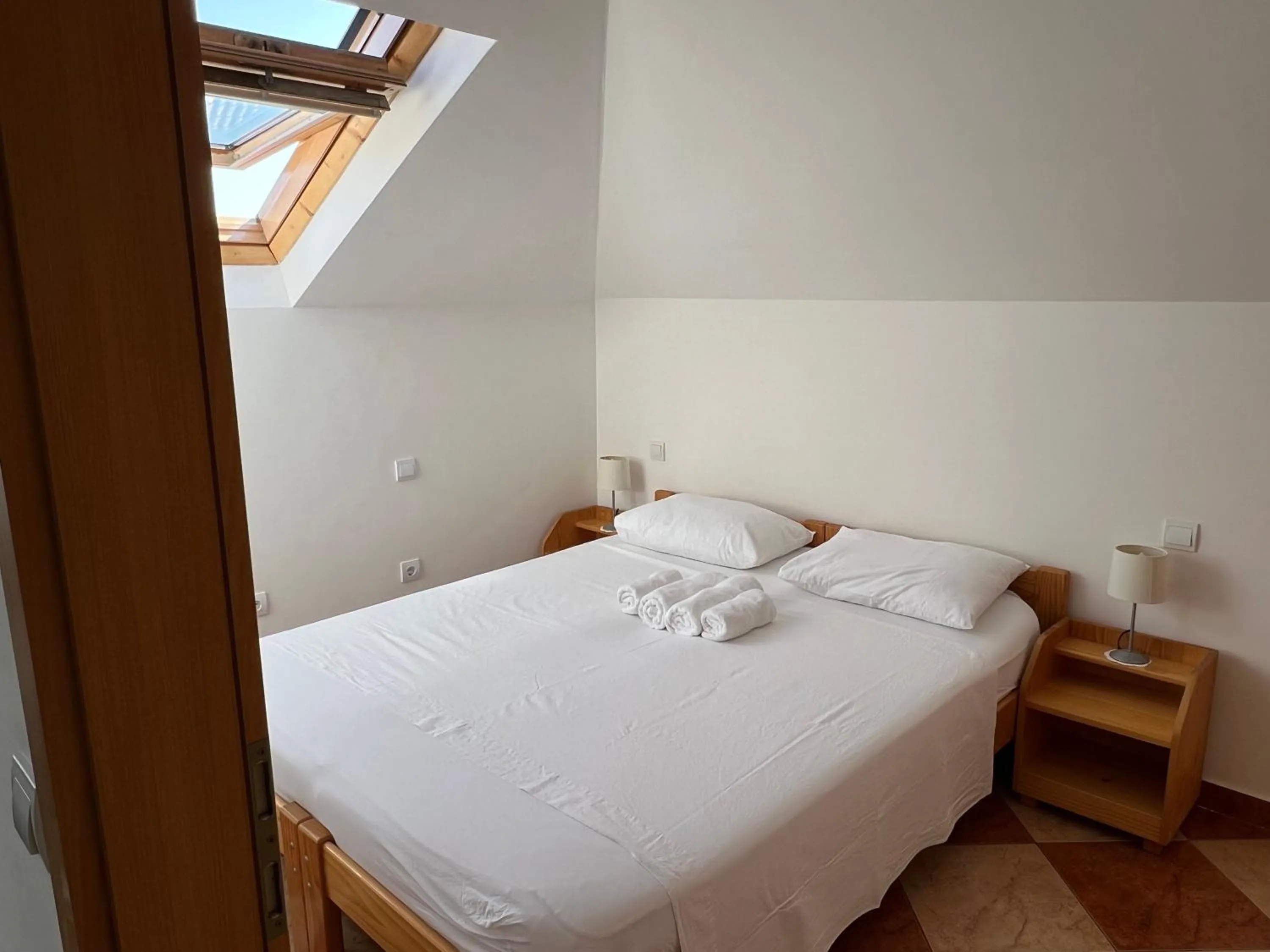 Bed in Apartments and Rooms Katija & Egon