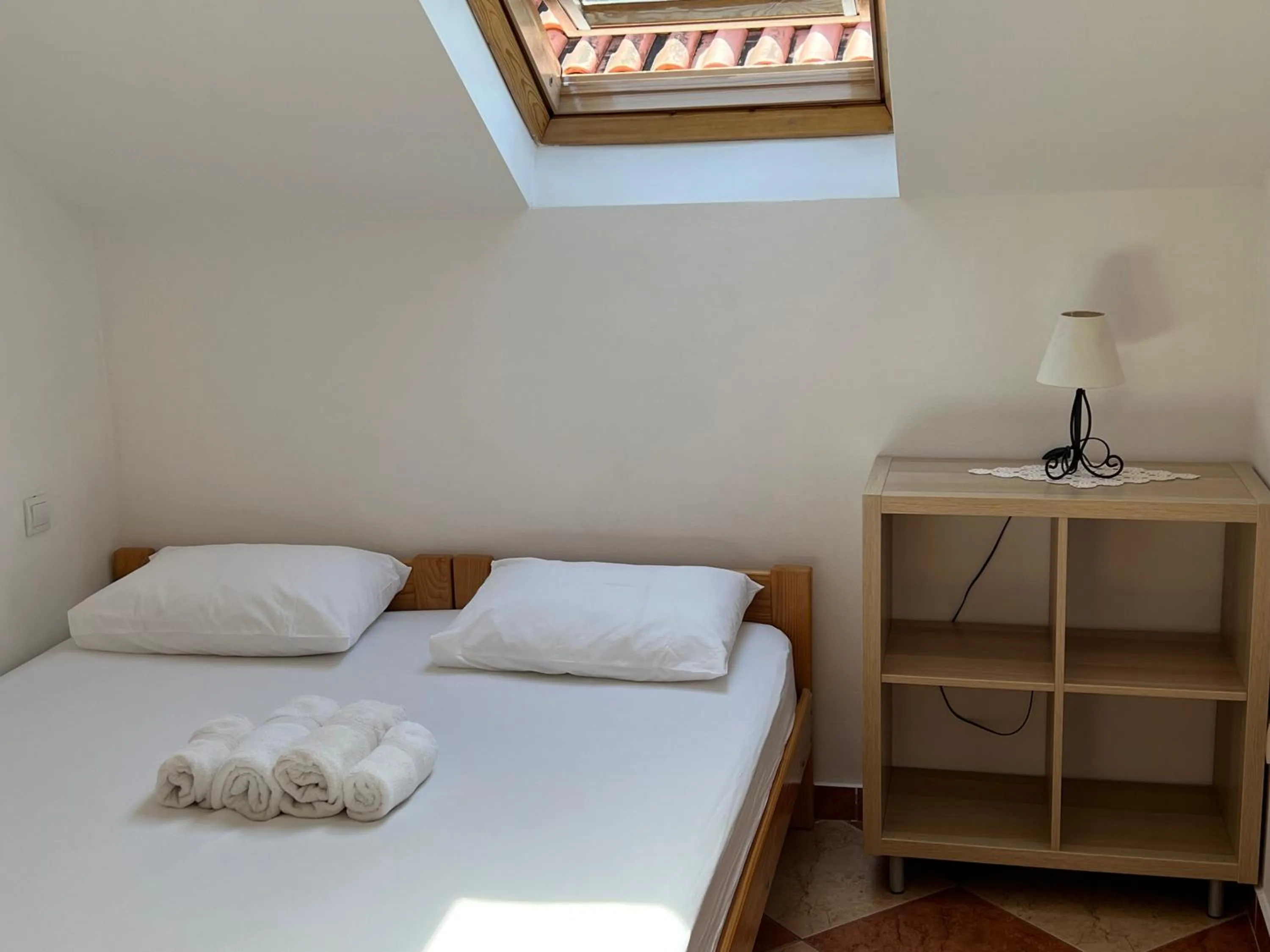 Bed in Apartments and Rooms Katija & Egon