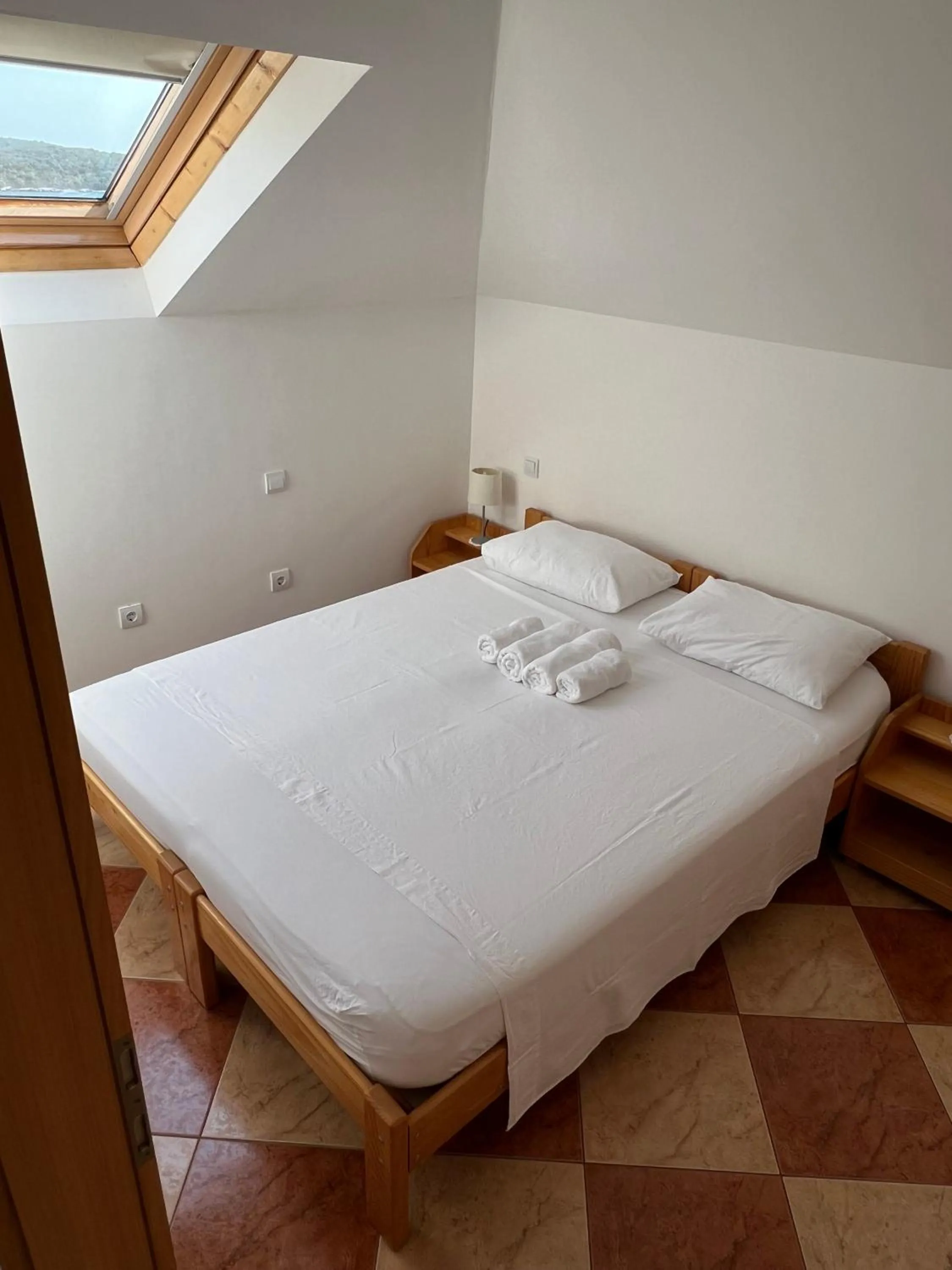 Bed in Apartments and Rooms Katija & Egon