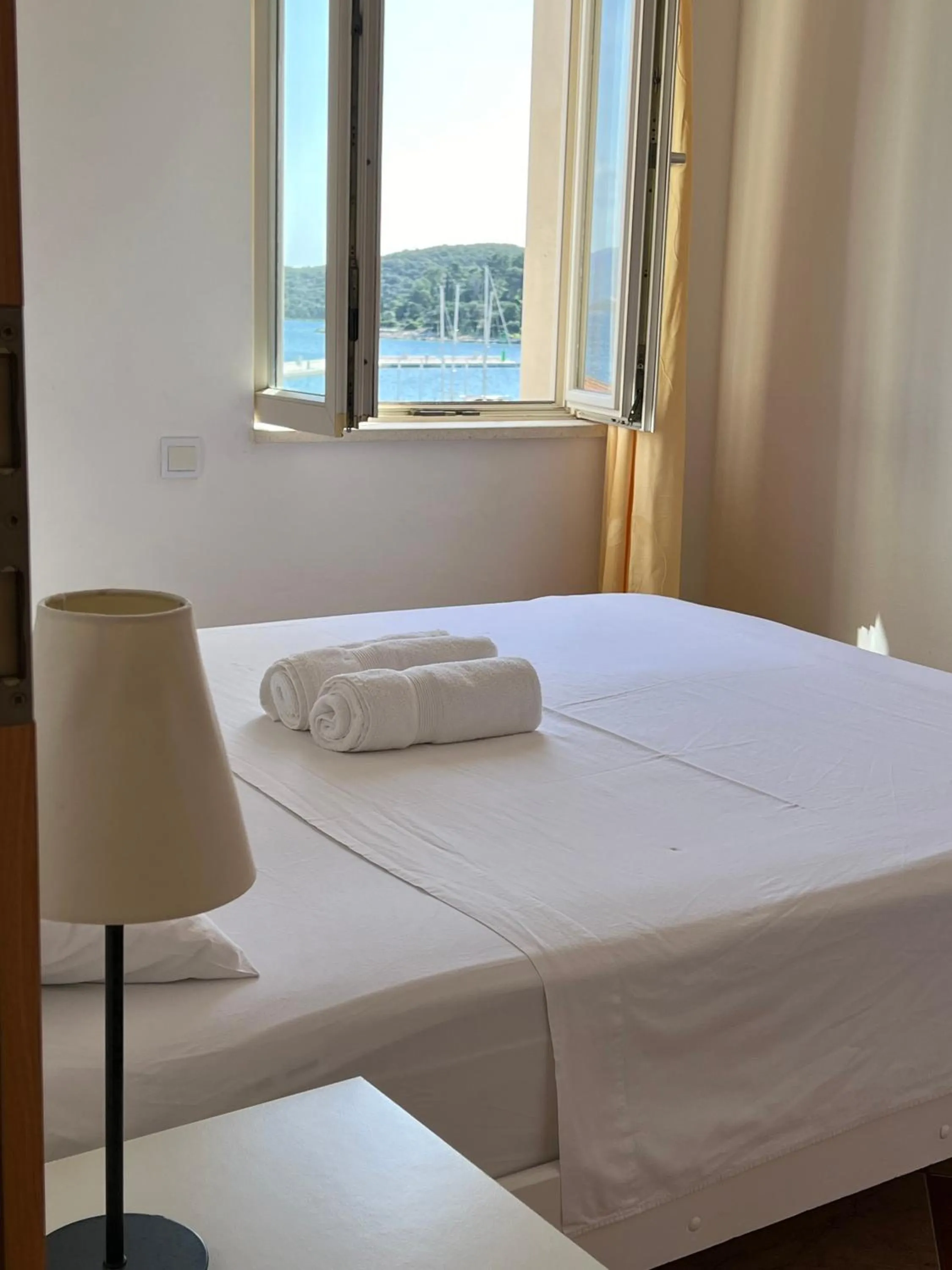 Bed in Apartments and Rooms Katija & Egon