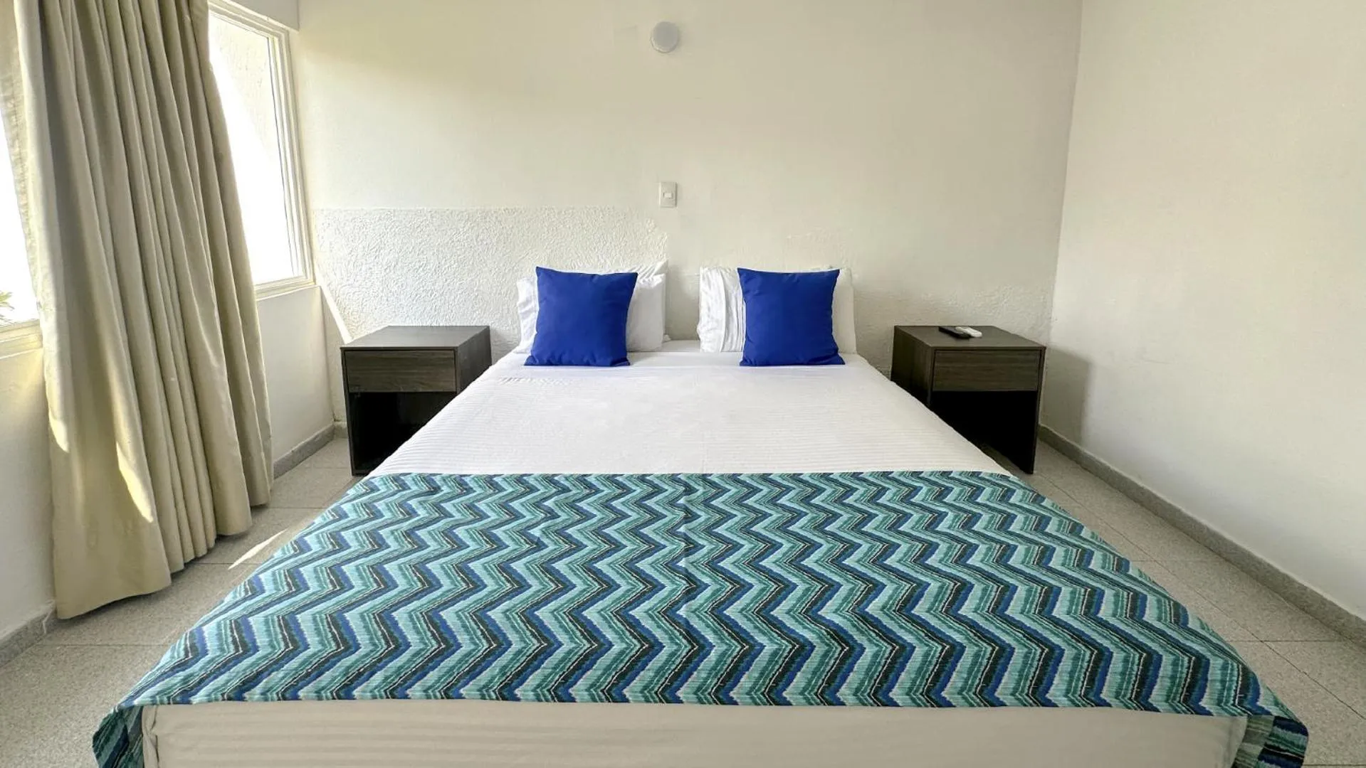 Bed in Hotel Blue Reef by On vacation