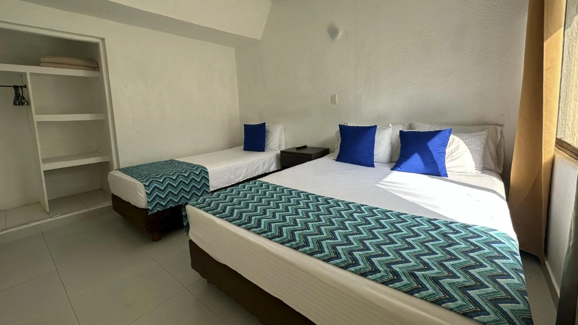 Bed in Hotel Blue Reef by On vacation