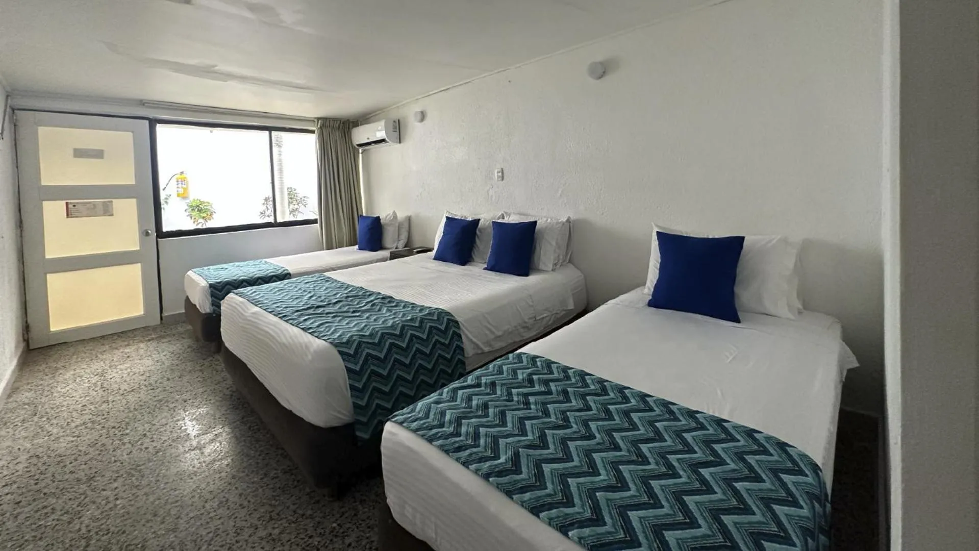 Bed in Hotel Blue Reef by On vacation