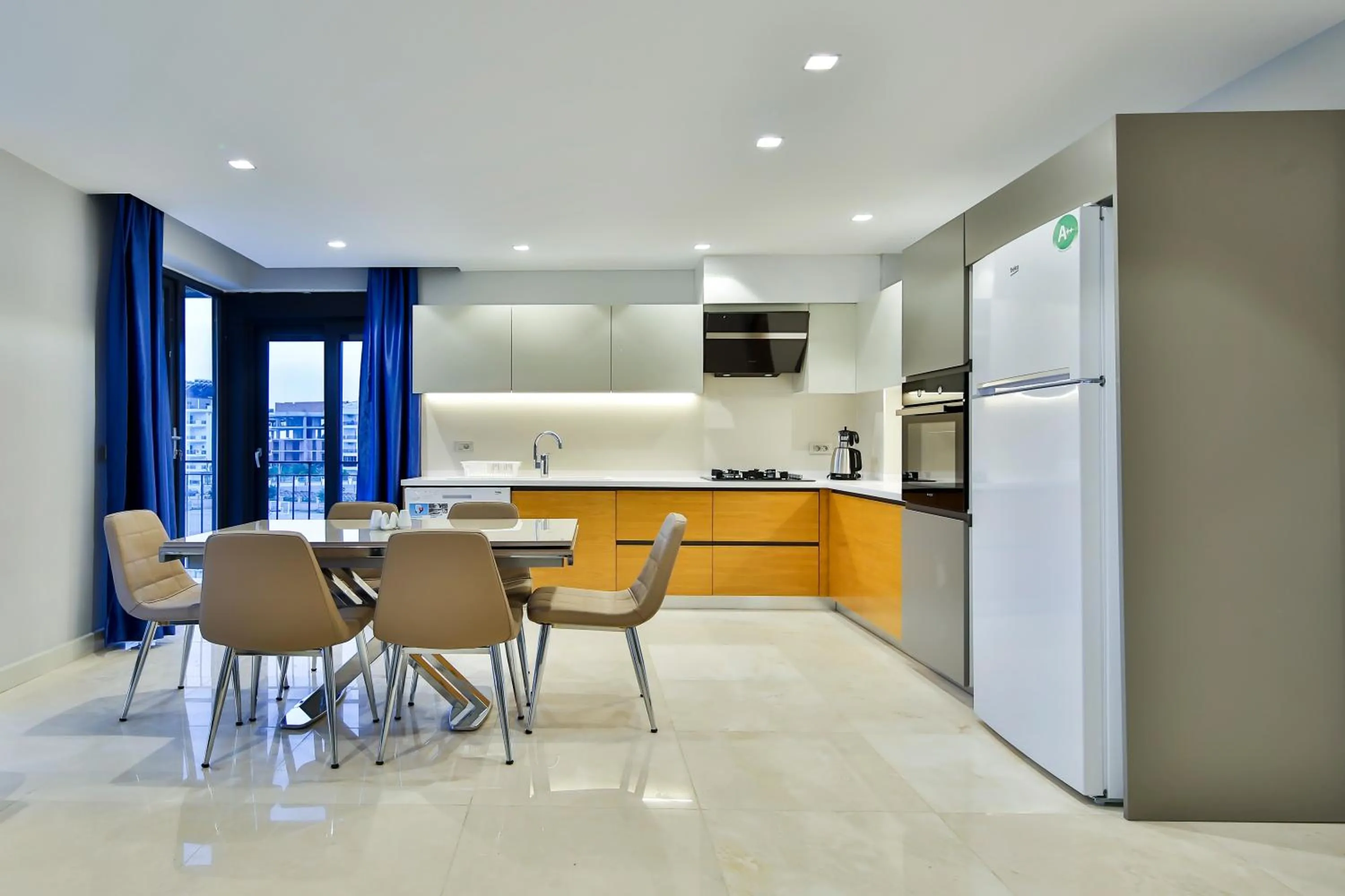 Kitchen or kitchenette in MENE SUITES