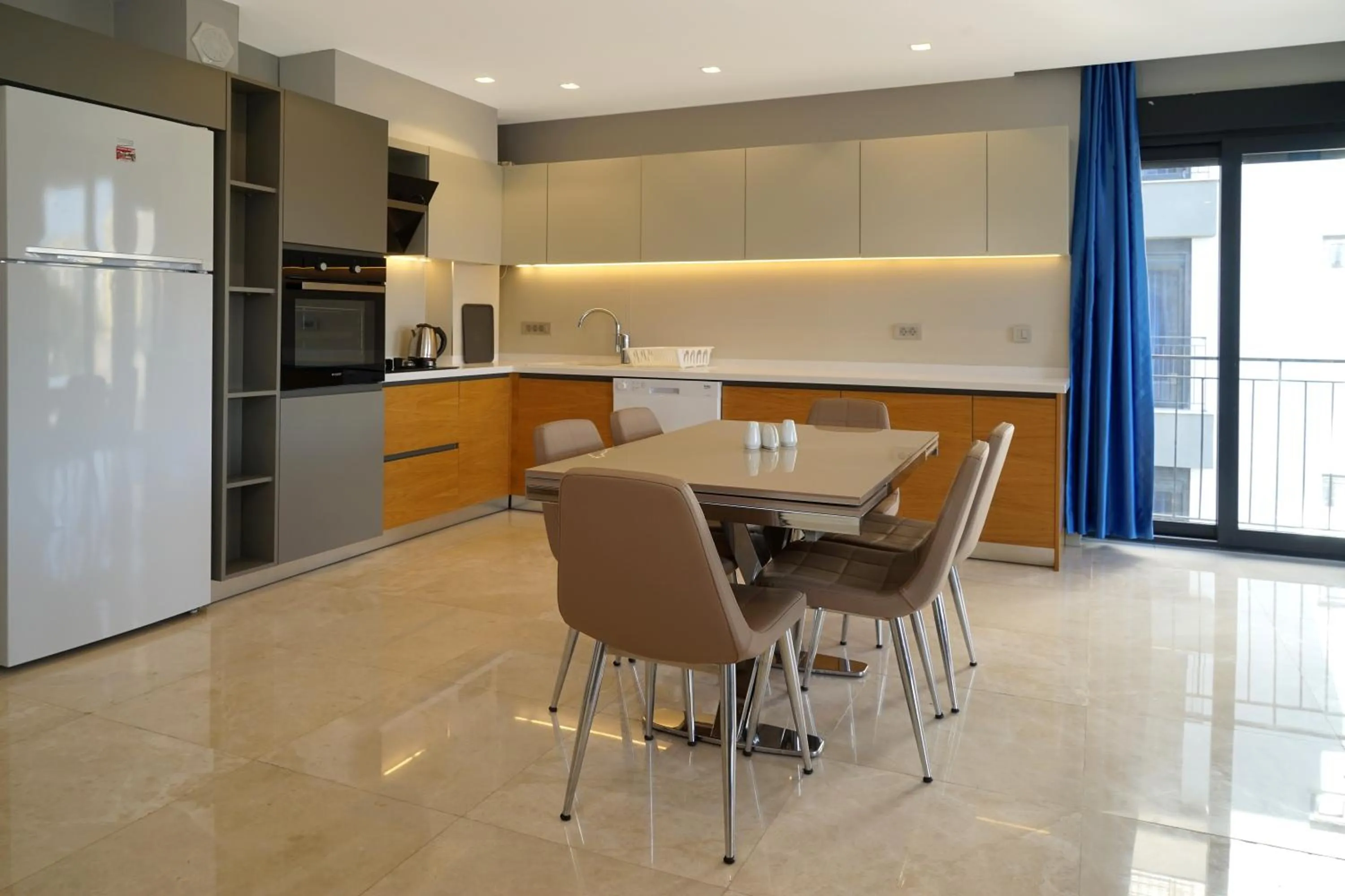 Kitchen or kitchenette in MENE SUITES